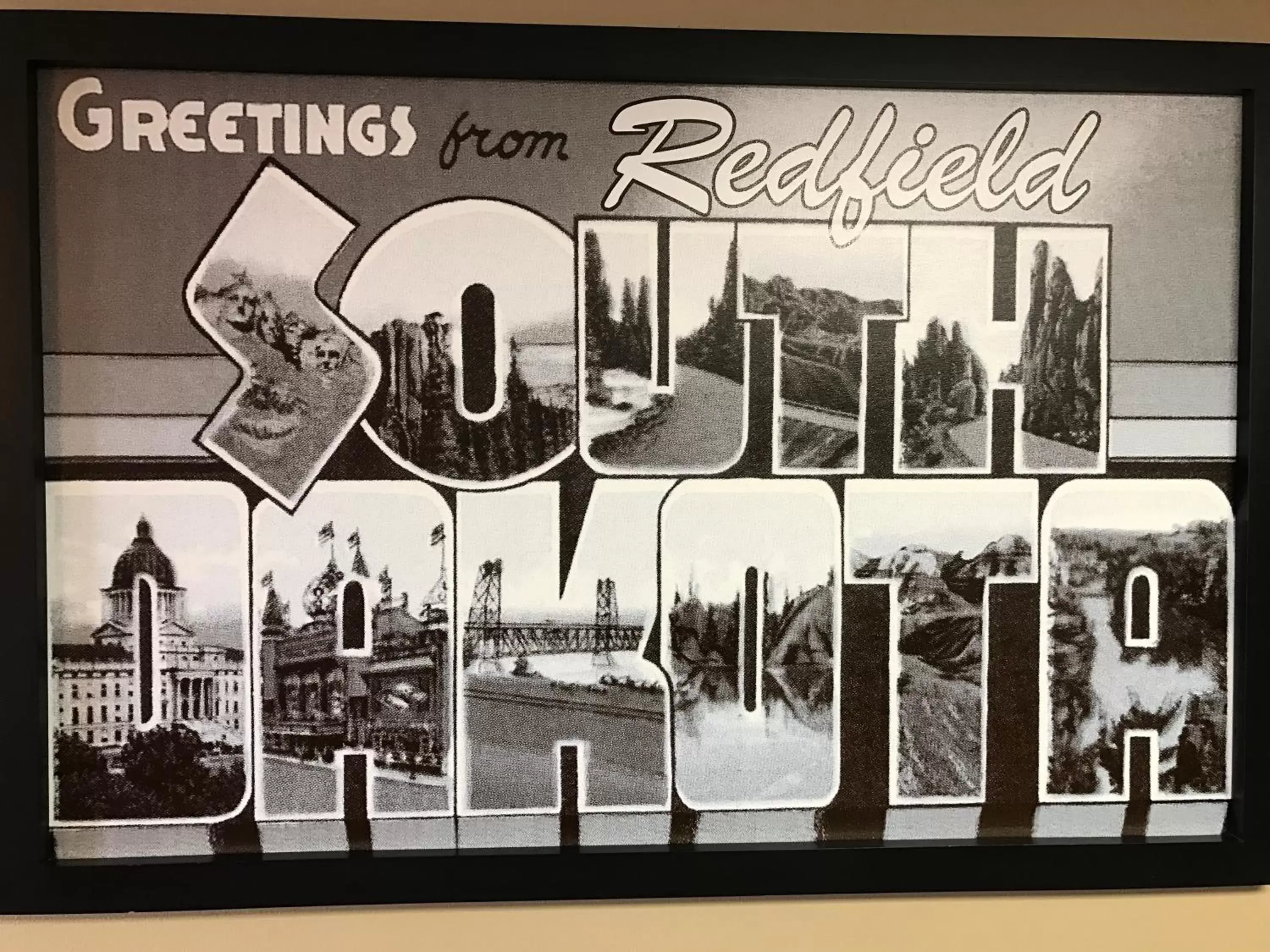 Property logo or sign in Super 8 by Wyndham Redfield