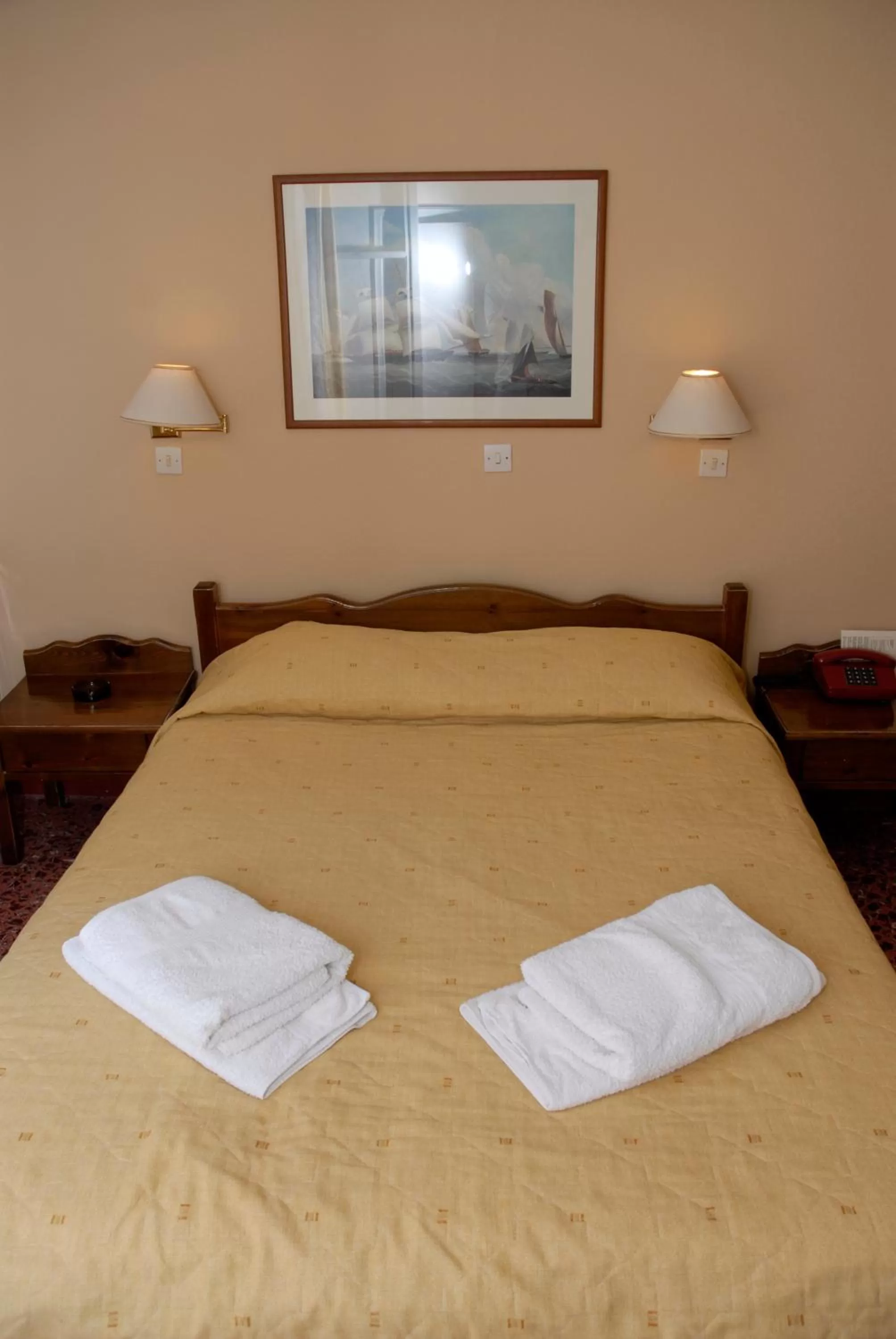 Bed in Amaryllis Hotel