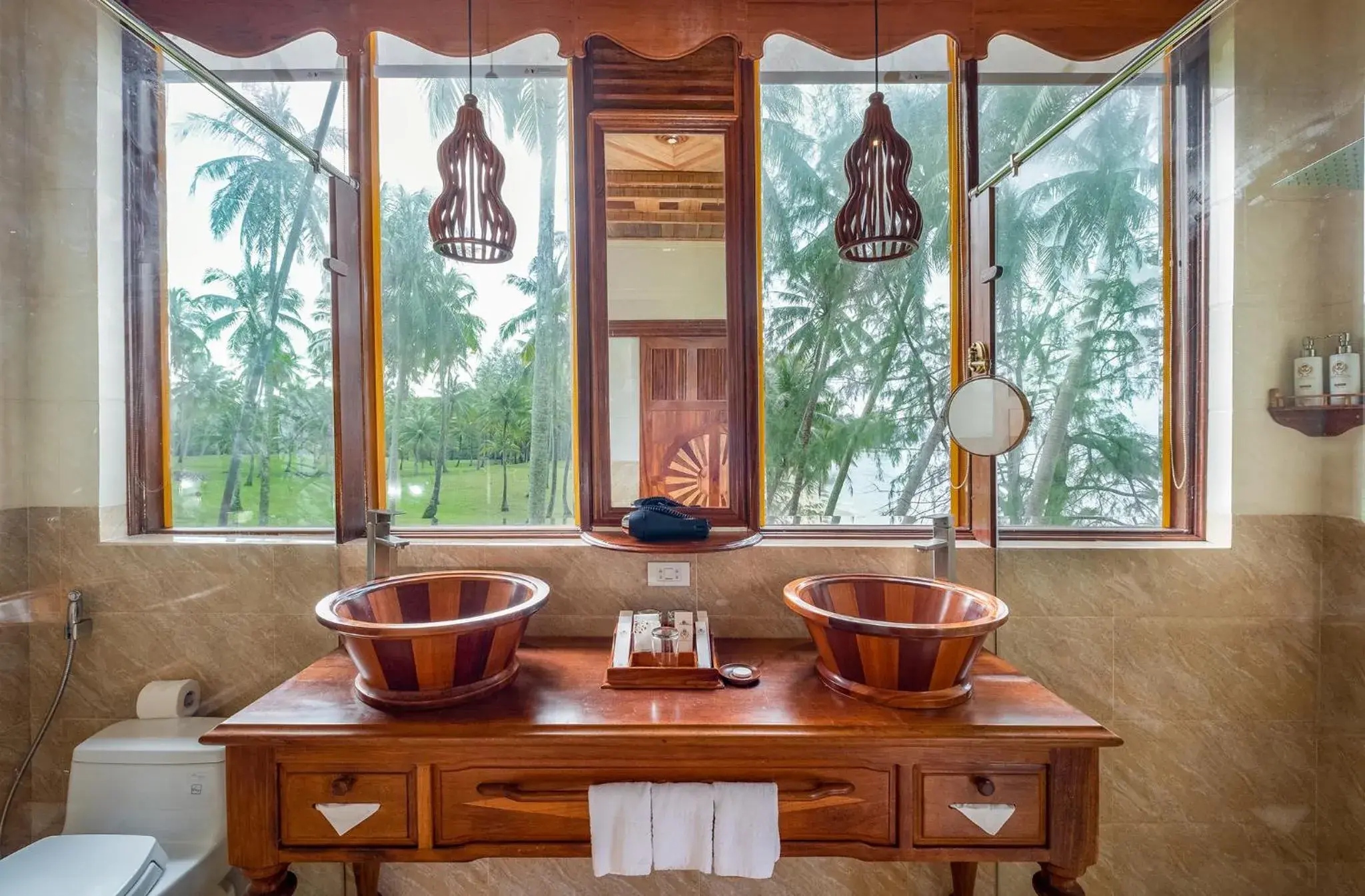 Bathroom in Coco Palm Beach Resort & Spa