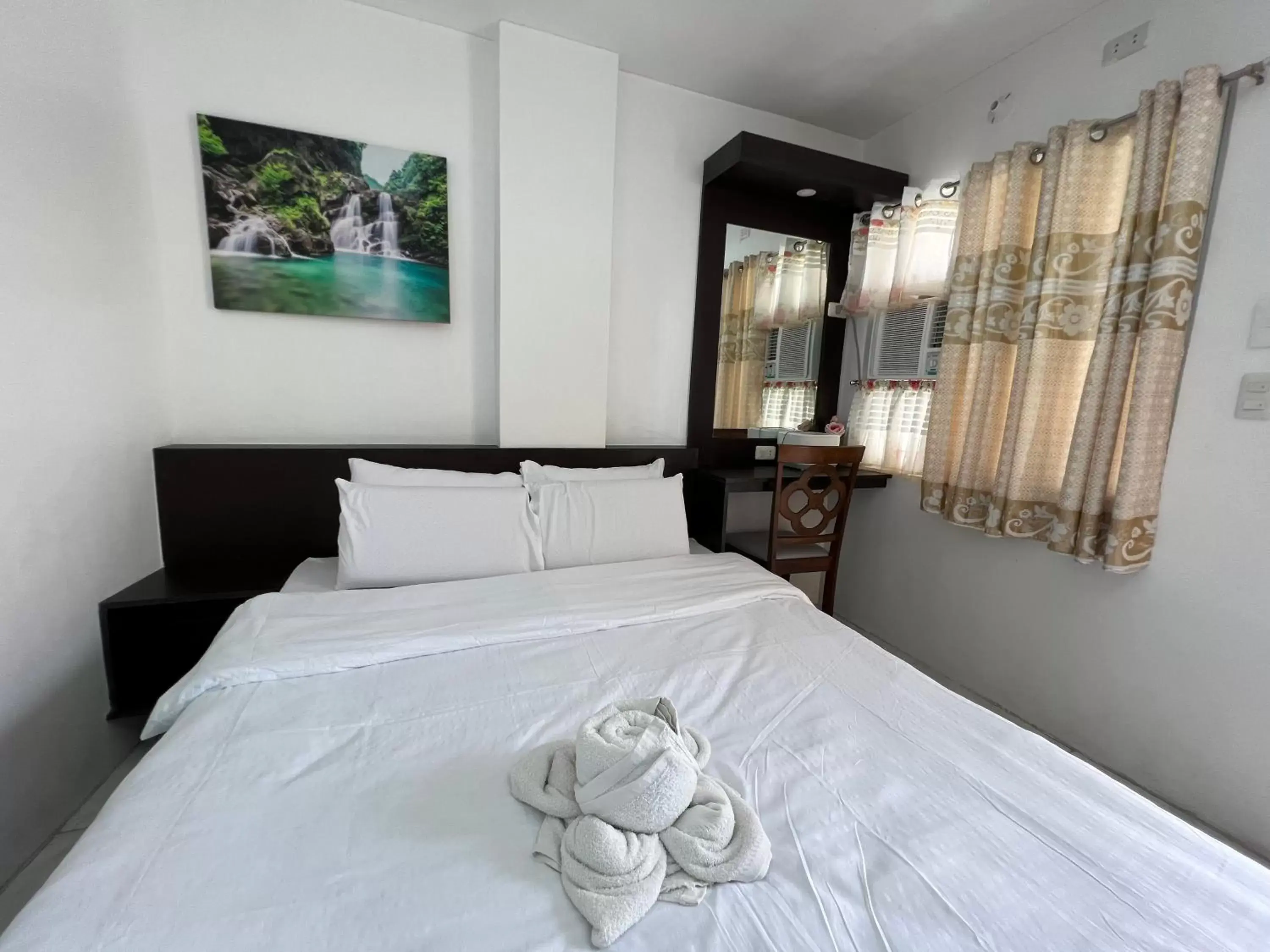 Bed in GingGing Hotel And Resort Bed in GingGing Hotel And Resort