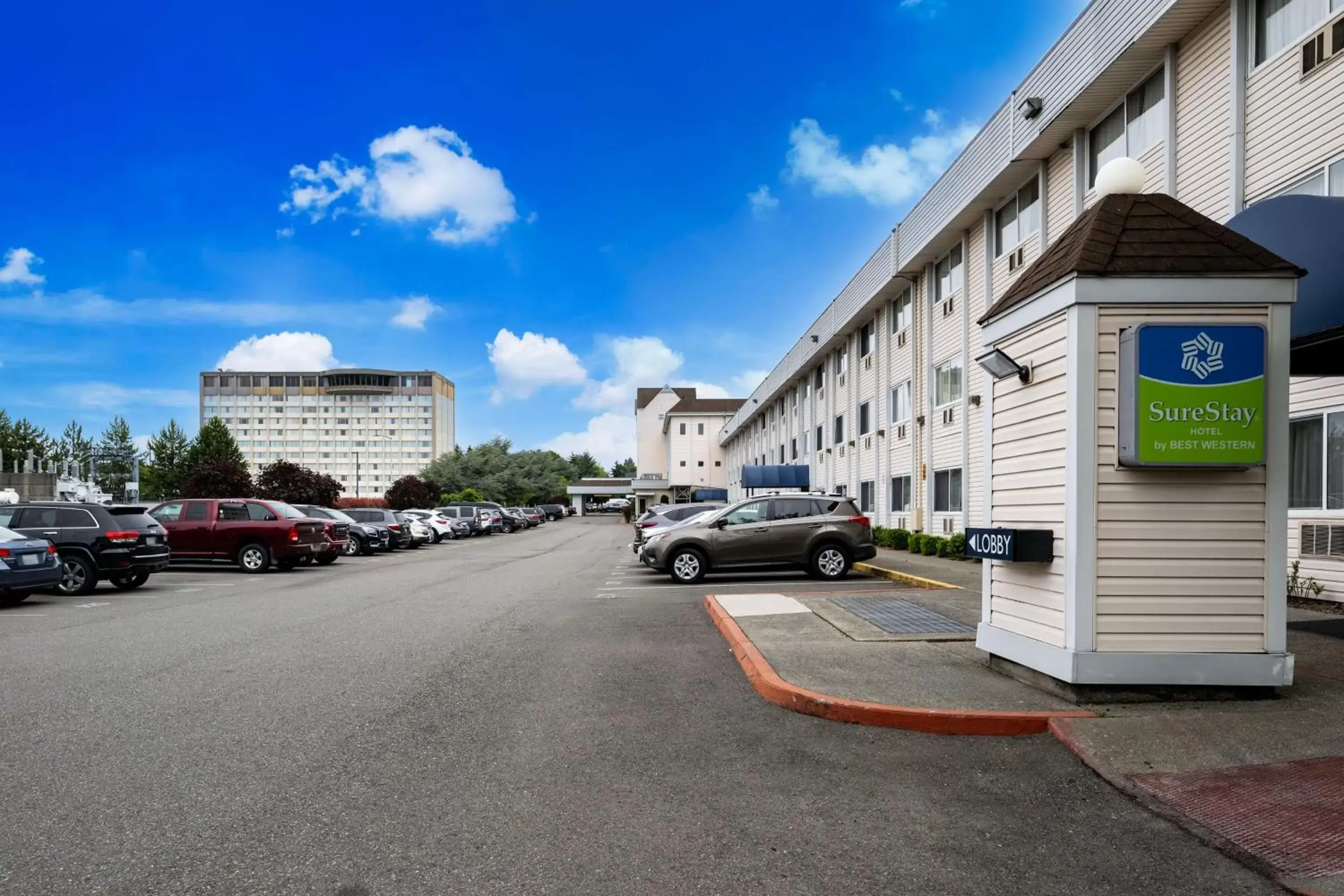 Property building in SureStay Hotel by Best Western SeaTac Airport North