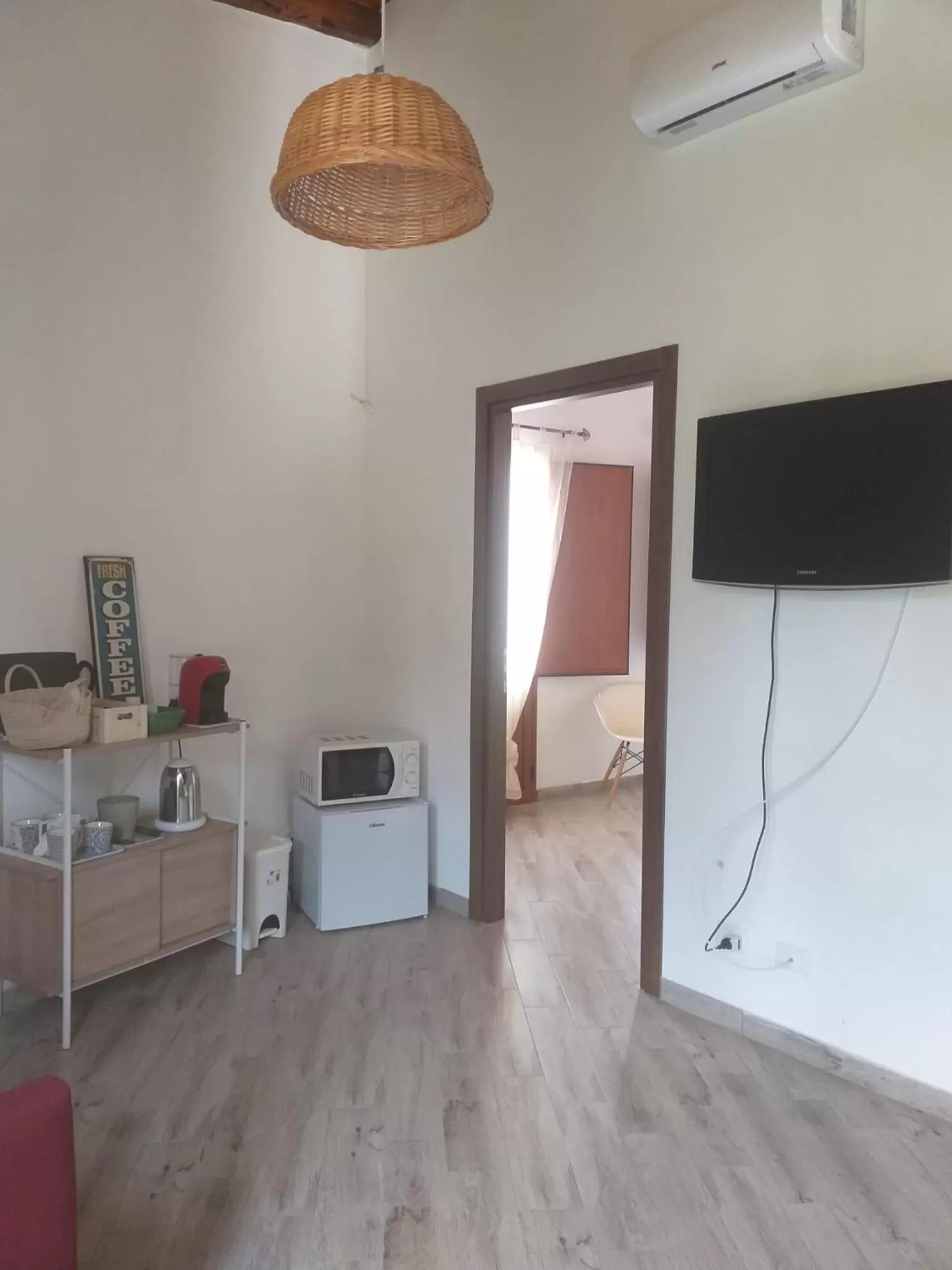 Seating area, TV/Entertainment Center in Enzo'S Suite