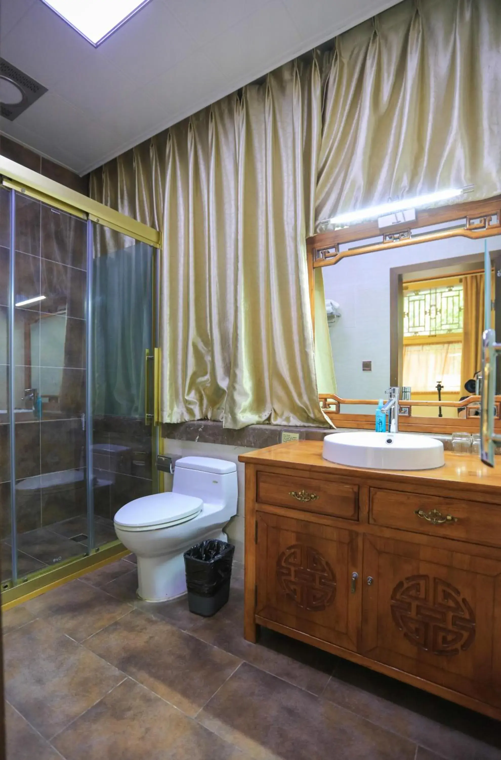 Bathroom in Beijing Jingyuan Courtyard Hotel