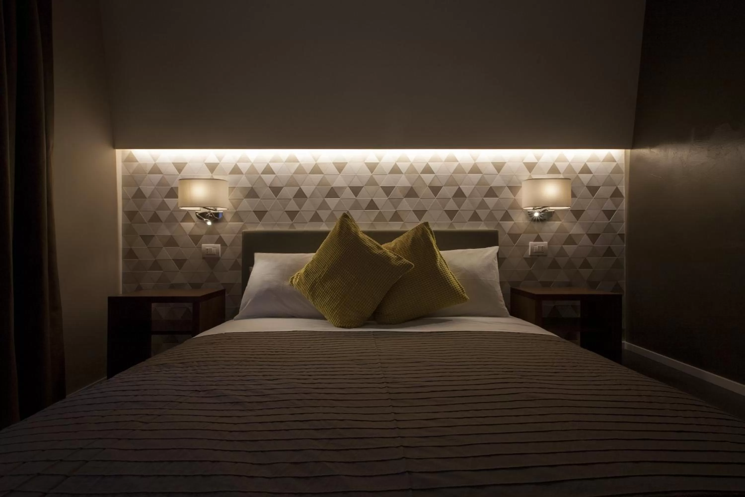 Decorative detail, Bed in NG Guest House Roma San Pietro