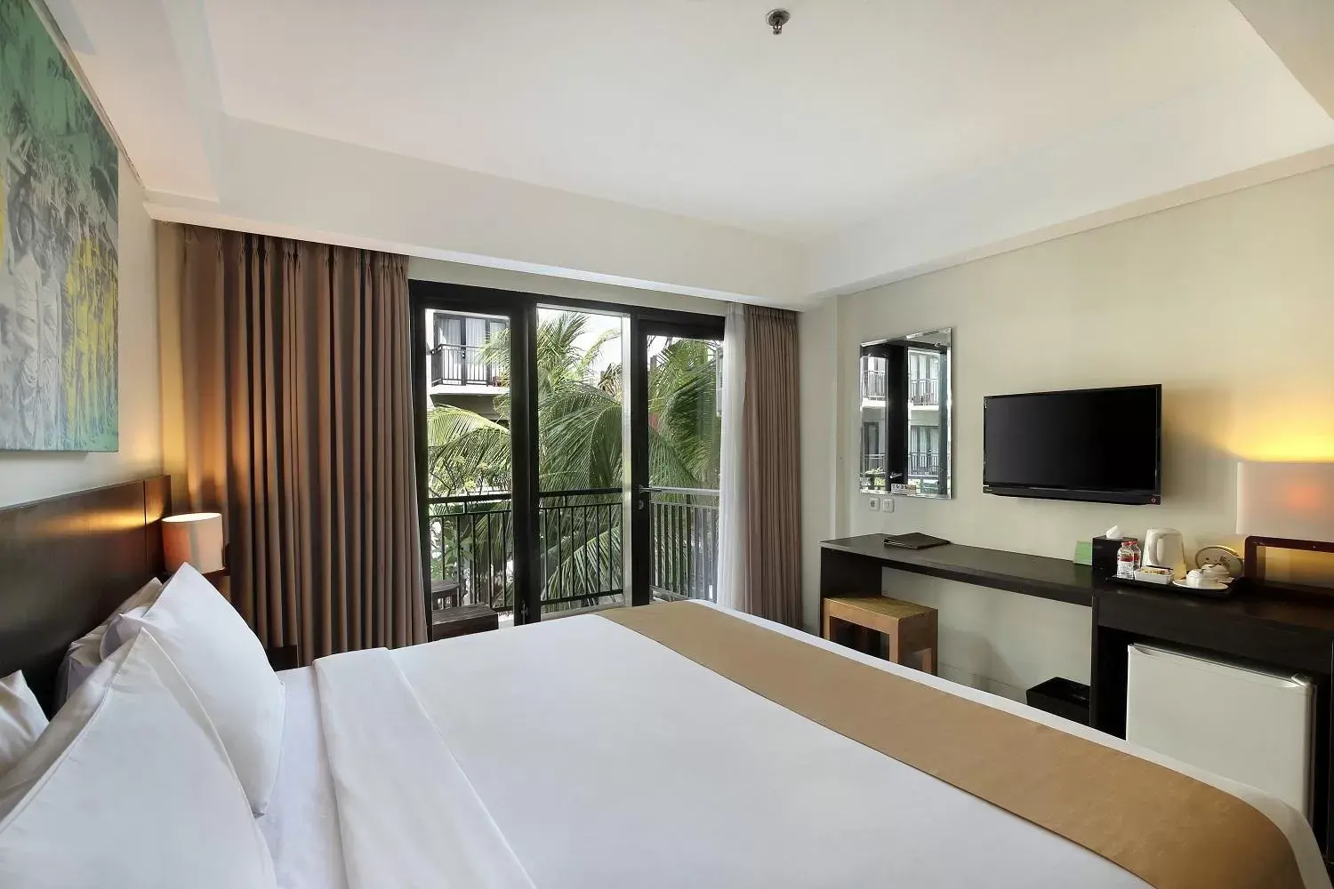 Bedroom in Rofa Kuta Hotel - CHSE Certified