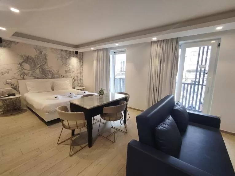 Photo of the whole room, Bed in The G Hotel by JL