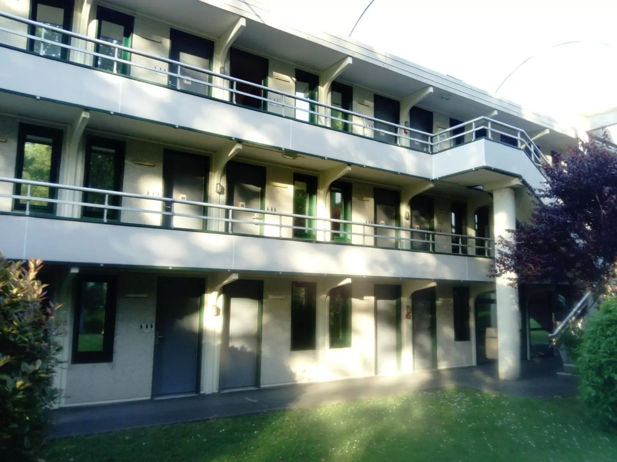 Garden view, Property Building in Premiere Classe Périgueux - Boulazac