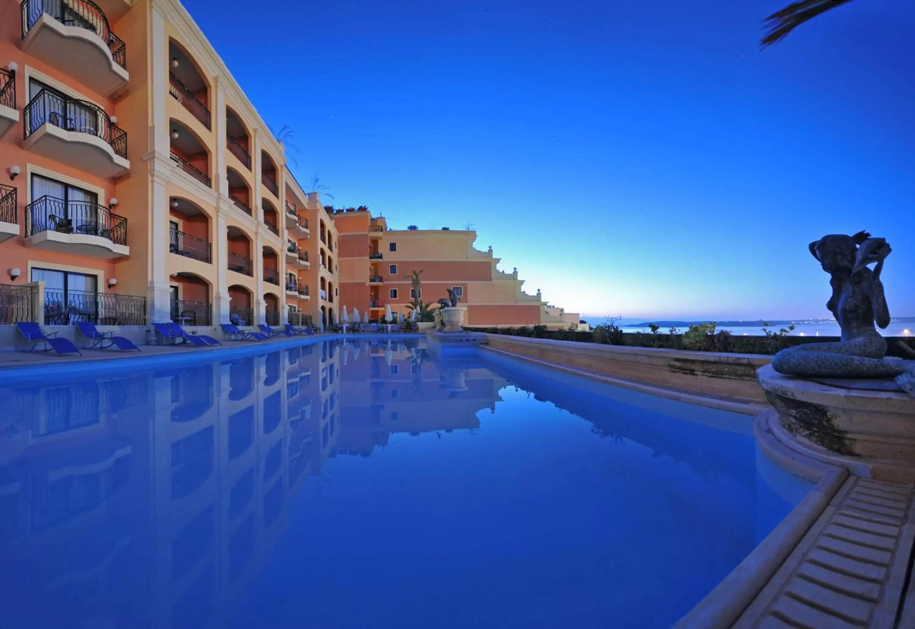 Swimming pool, Property Building in Grand Hotel Gozo