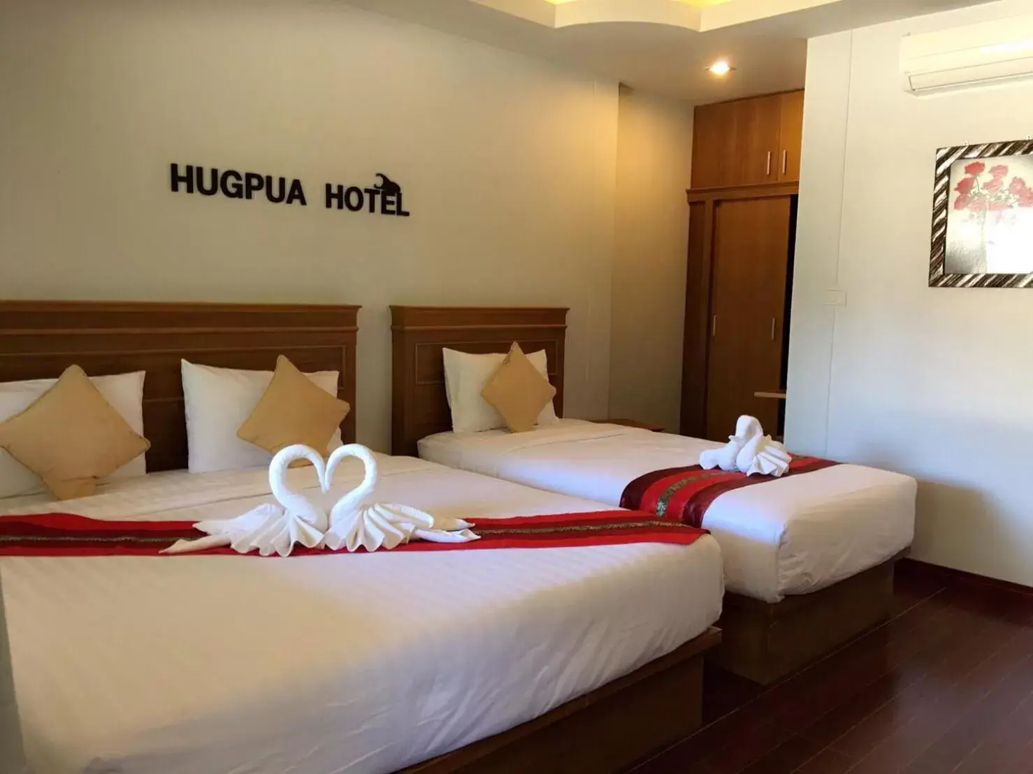 Bed in Hugpua Hotel