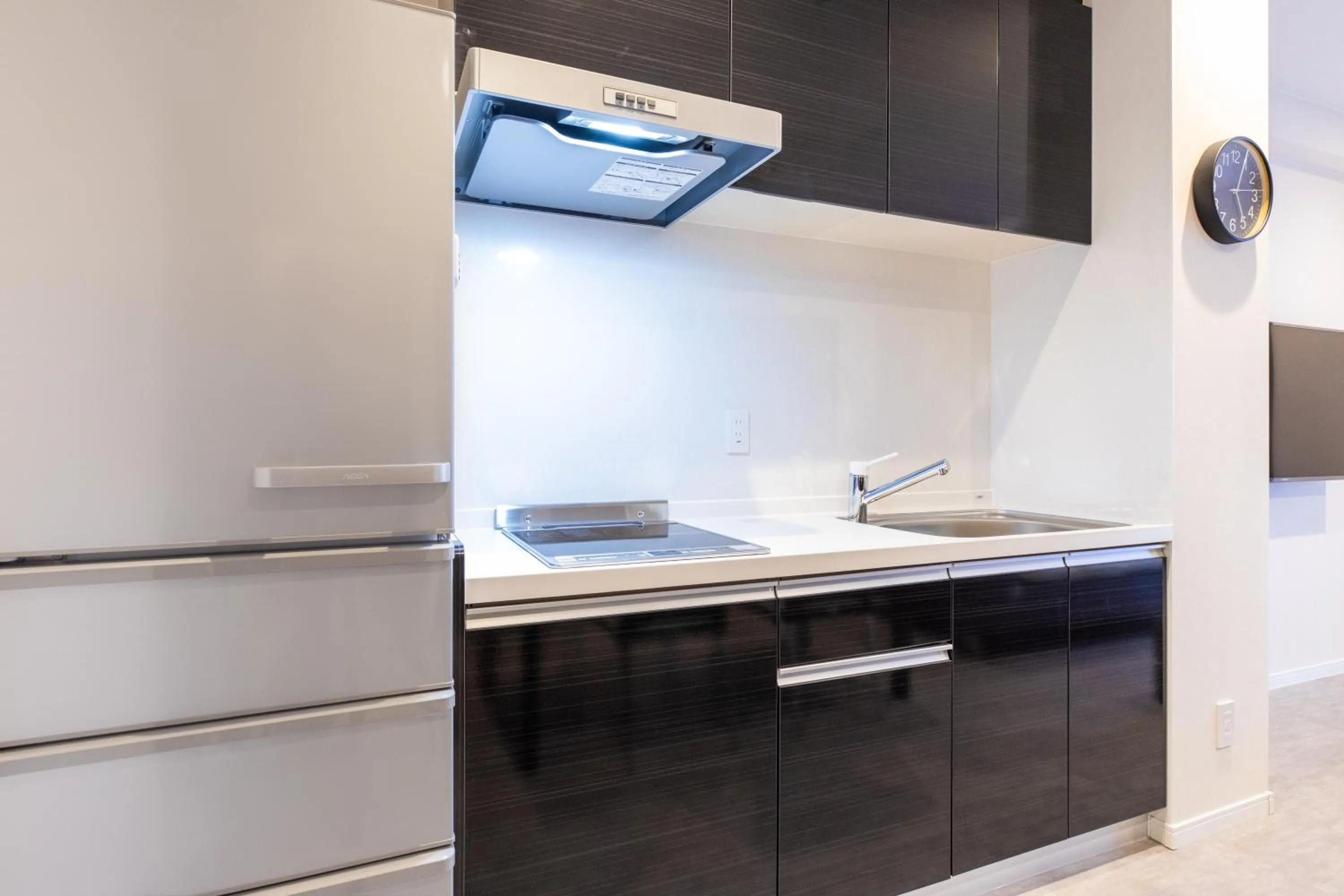 Kitchen or kitchenette in LAPIN MIHAMA Residence Hotel