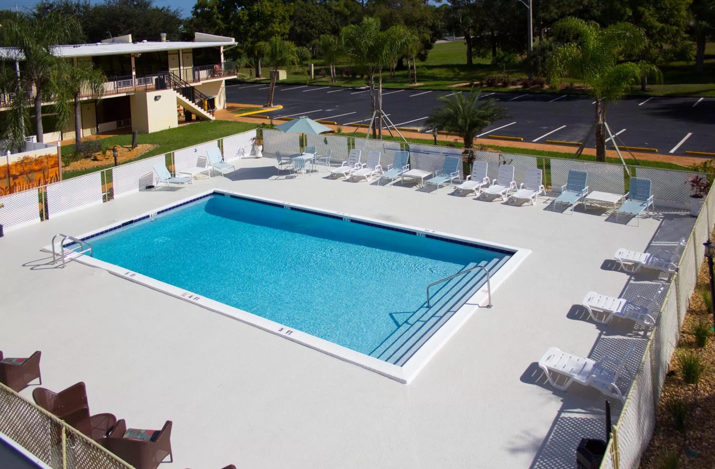 Swimming pool in At Home Inn - Fort Pierce