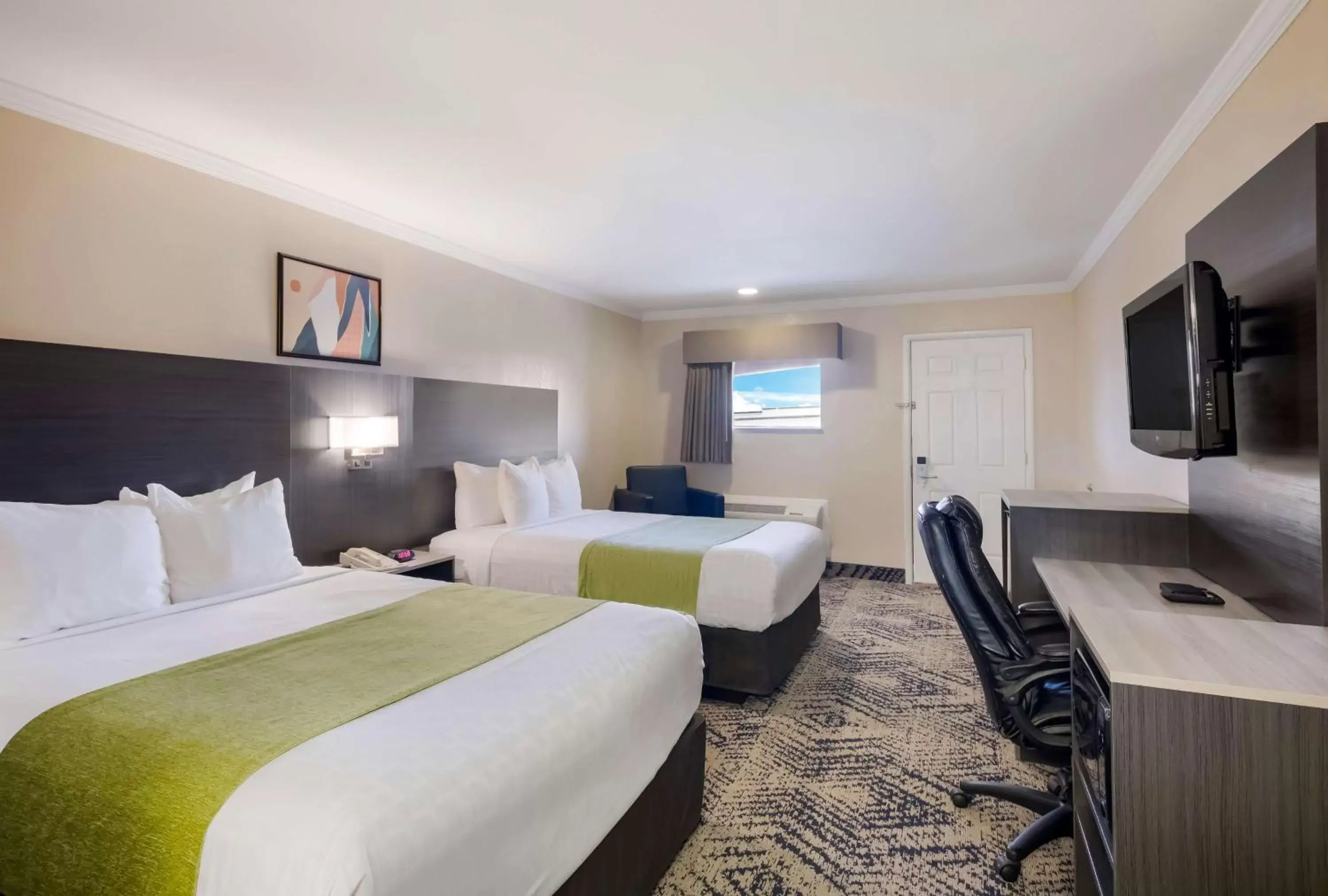 Bedroom in SureStay Hotel by Best Western Rockdale