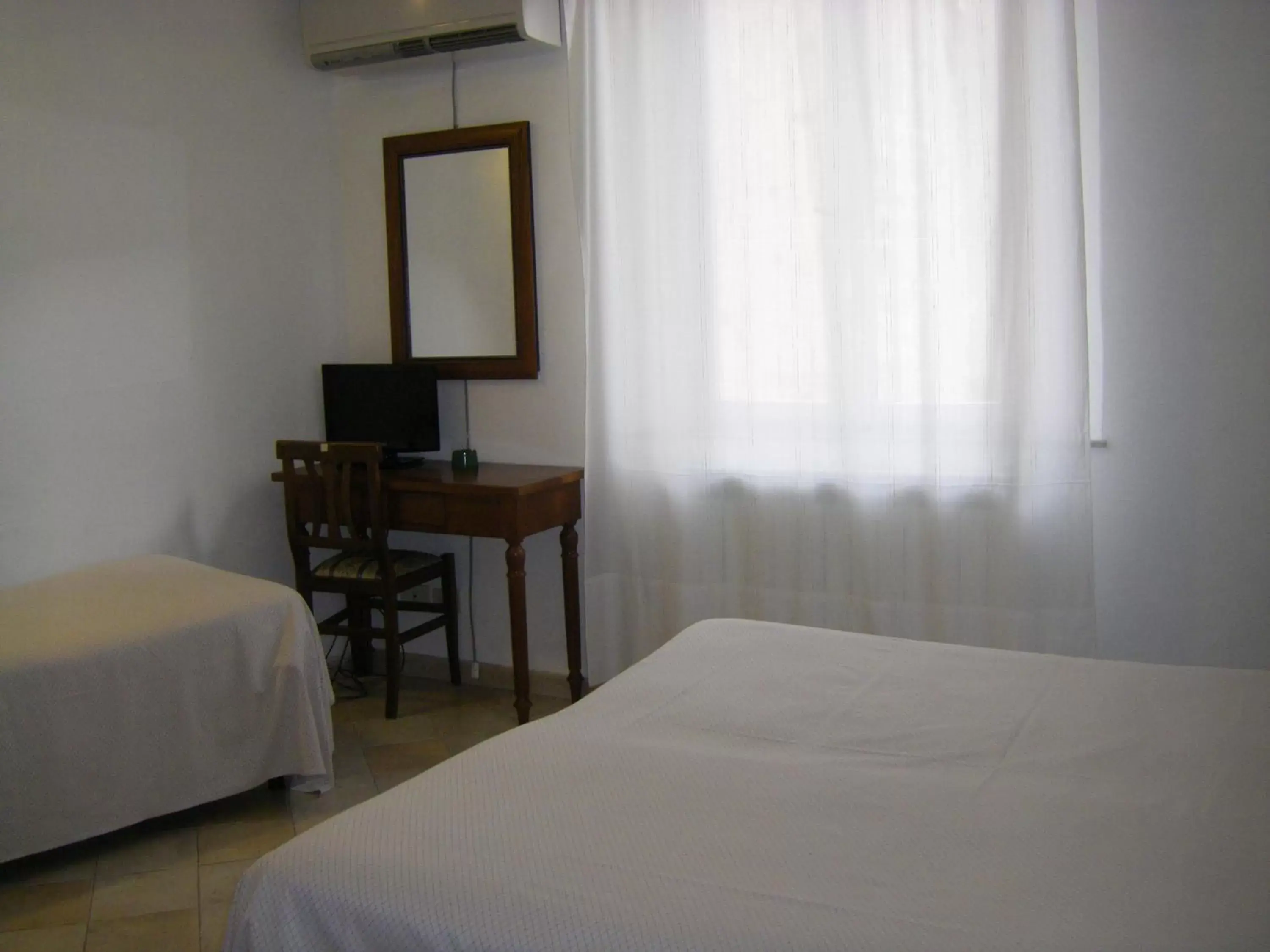 Bed in Albergo Cannon d'Oro