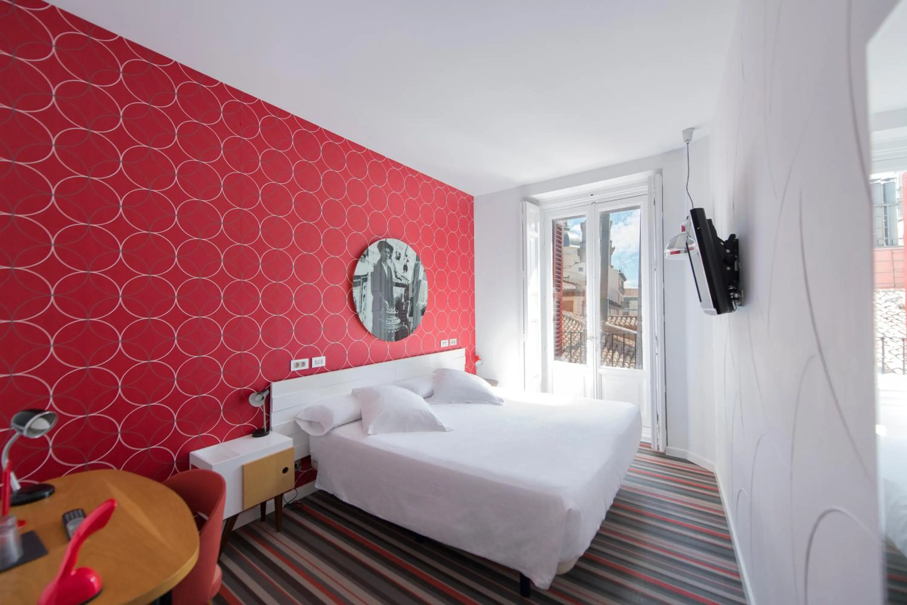 Bed in Posada del Dragón Boutique Hotel