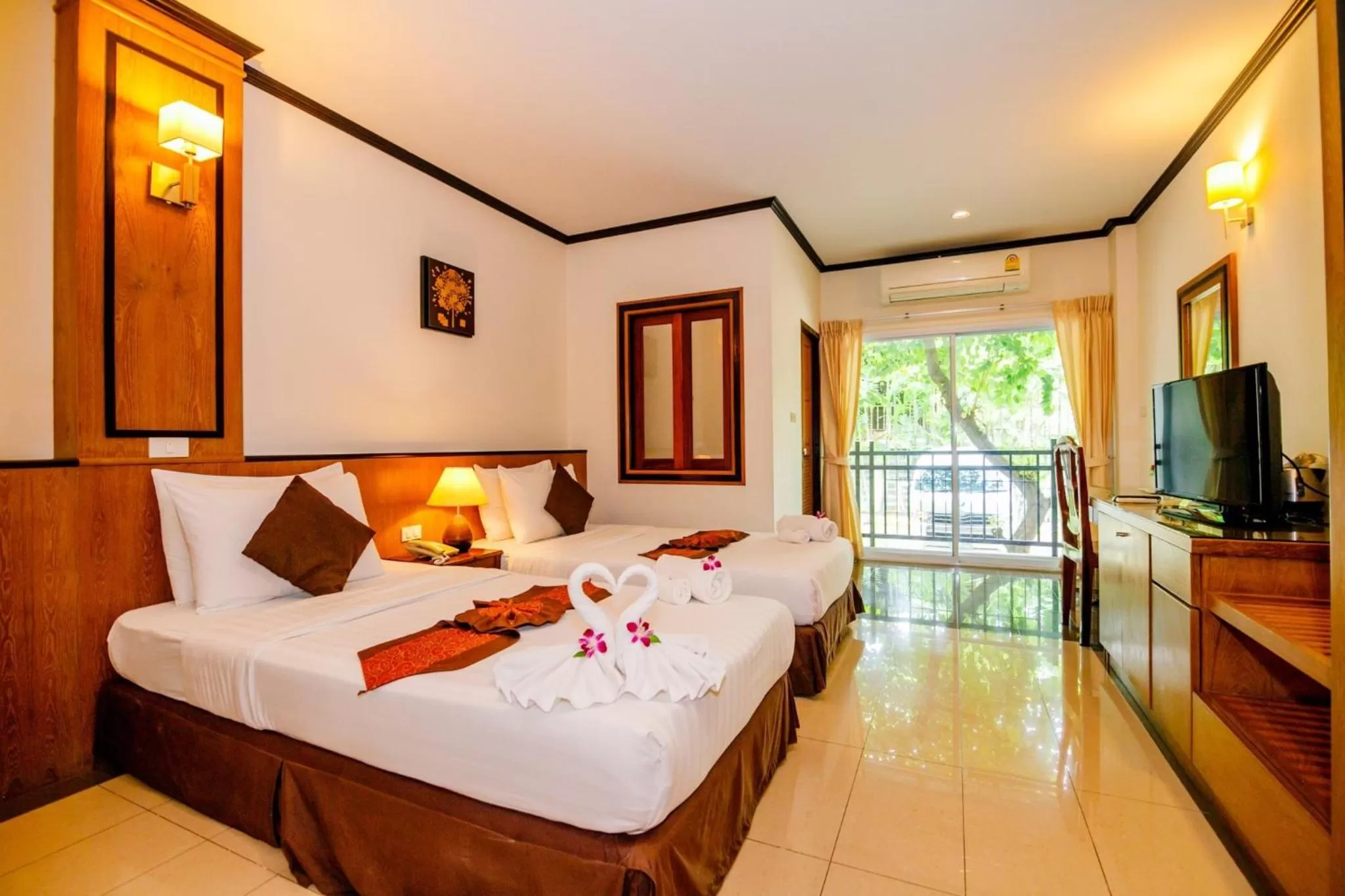 Bed in Rapeepan Ville Hotel