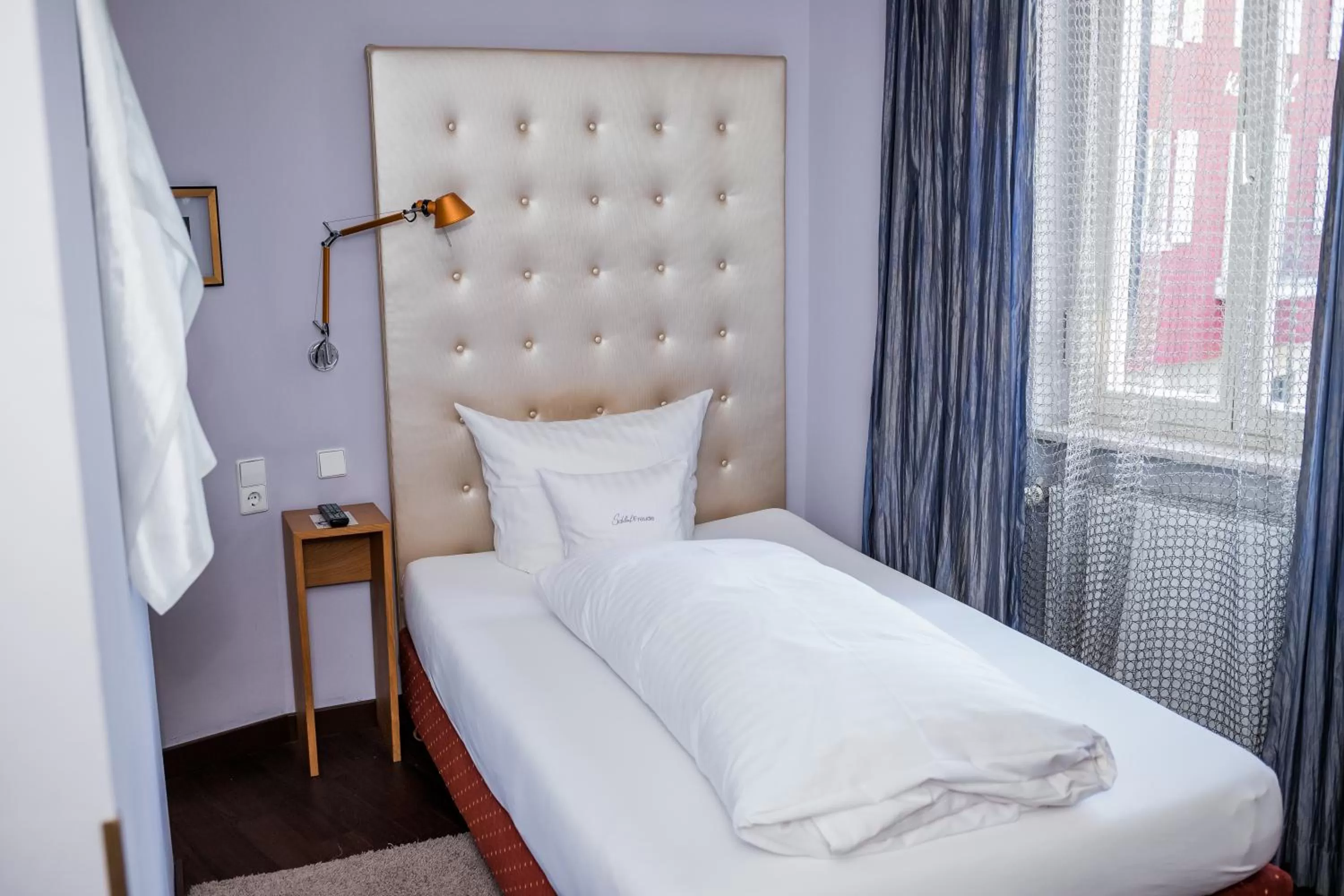 Photo of the whole room, Bed in Romantikhotel Rebstock art & design