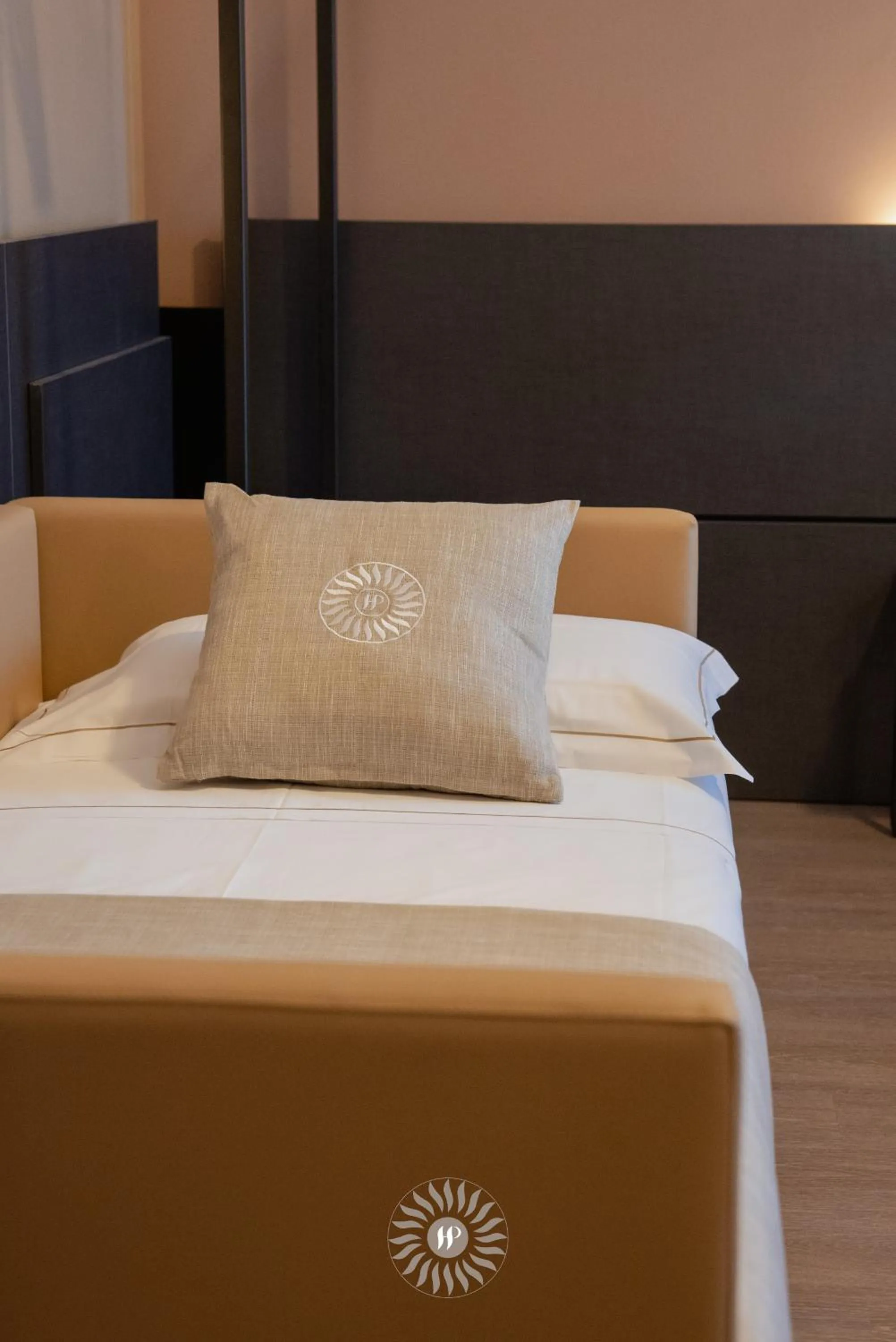 Bed in Hotel Puccini