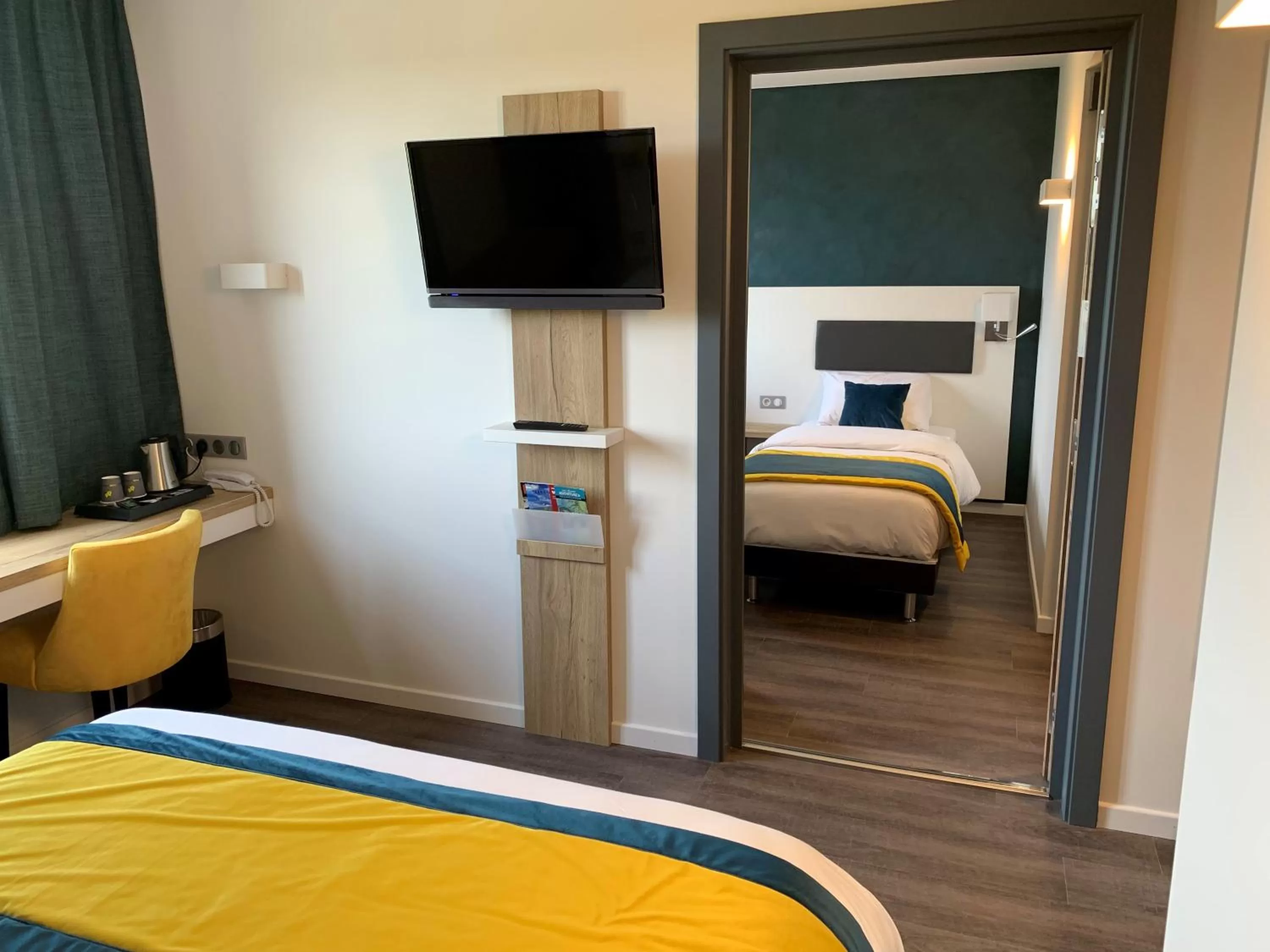 Bed in ATOLON PARK HOTEL