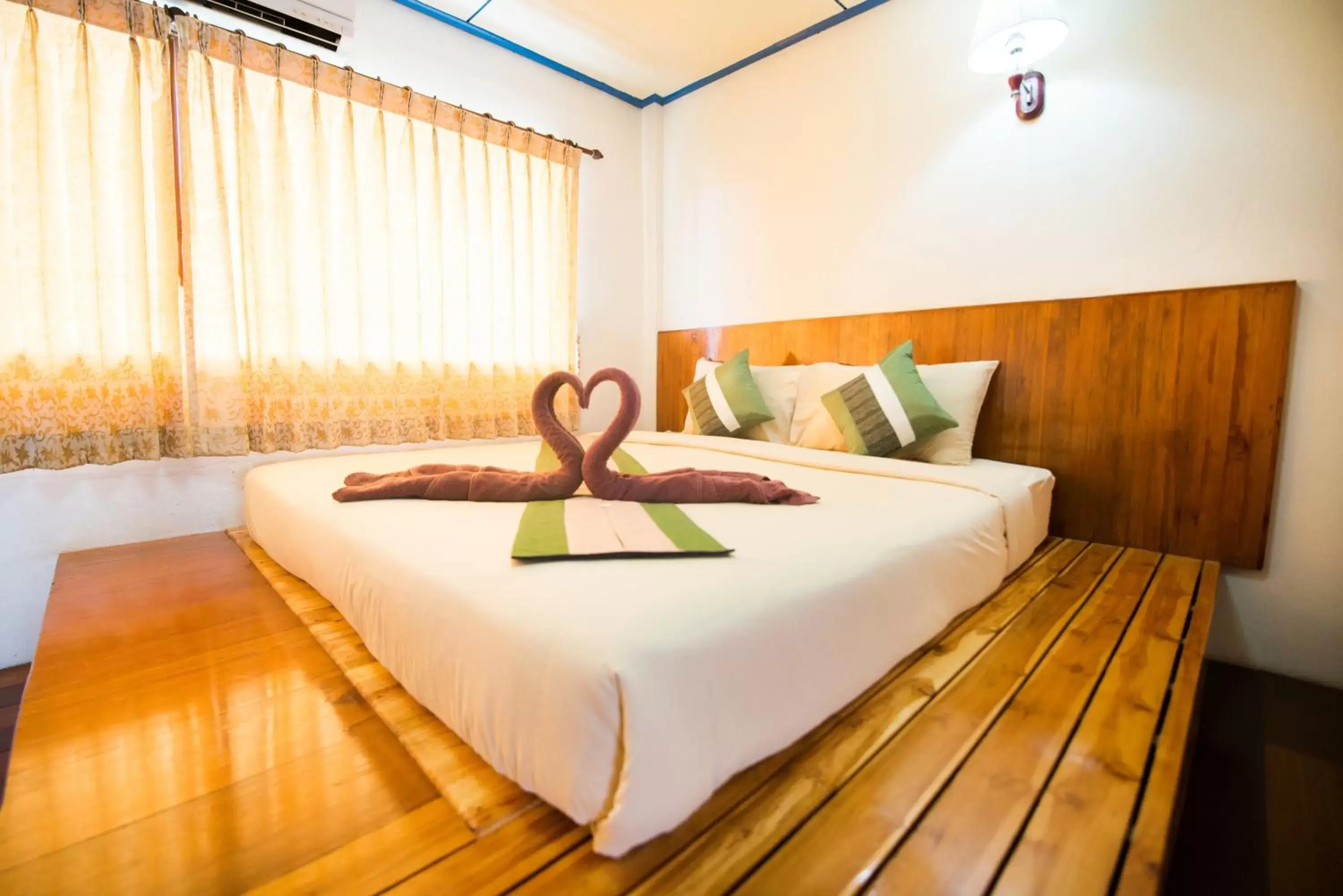 Bed in Pongphen Guesthouse - SHA Plus Certified