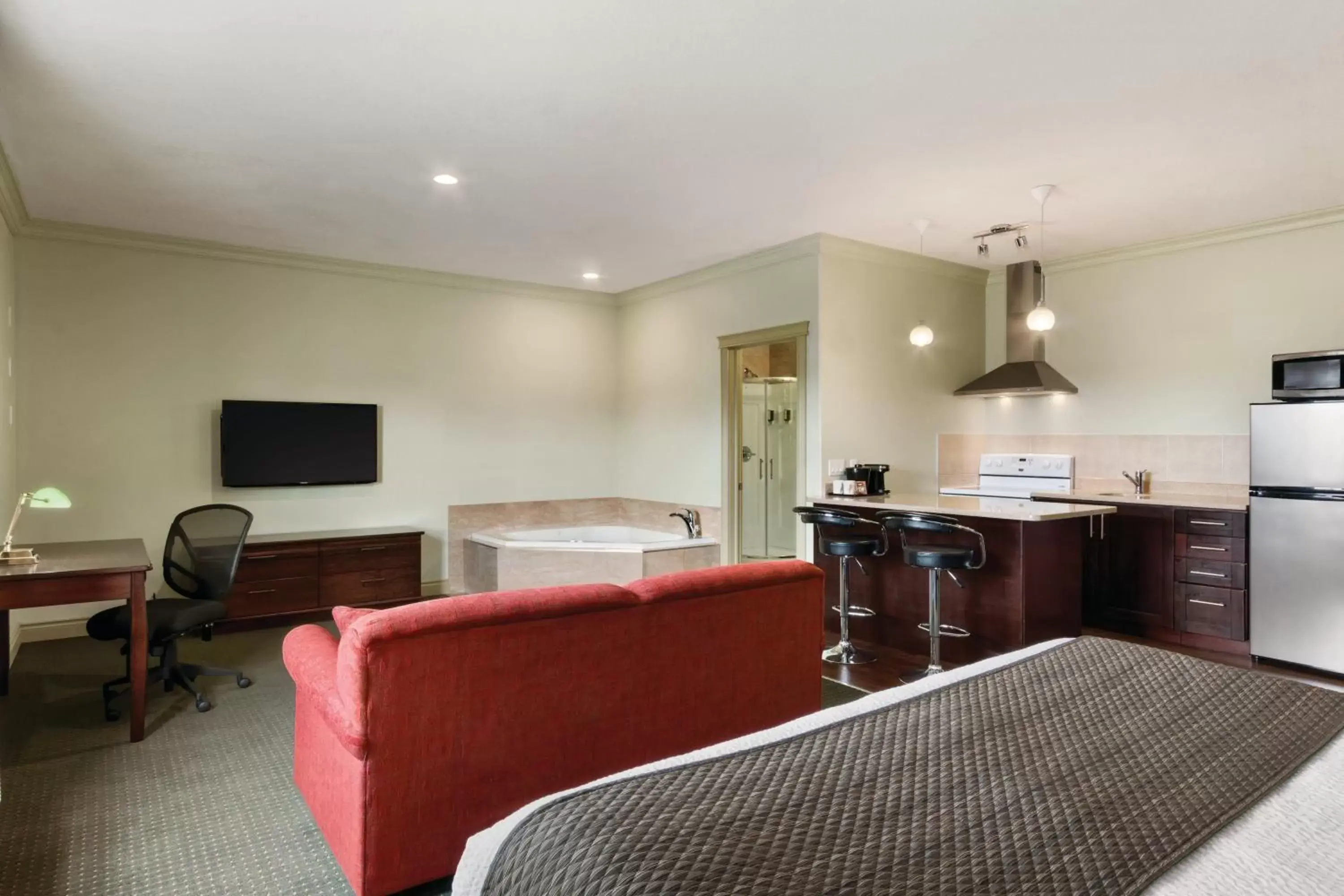 Bedroom, Seating Area in Quality Inn & Suites