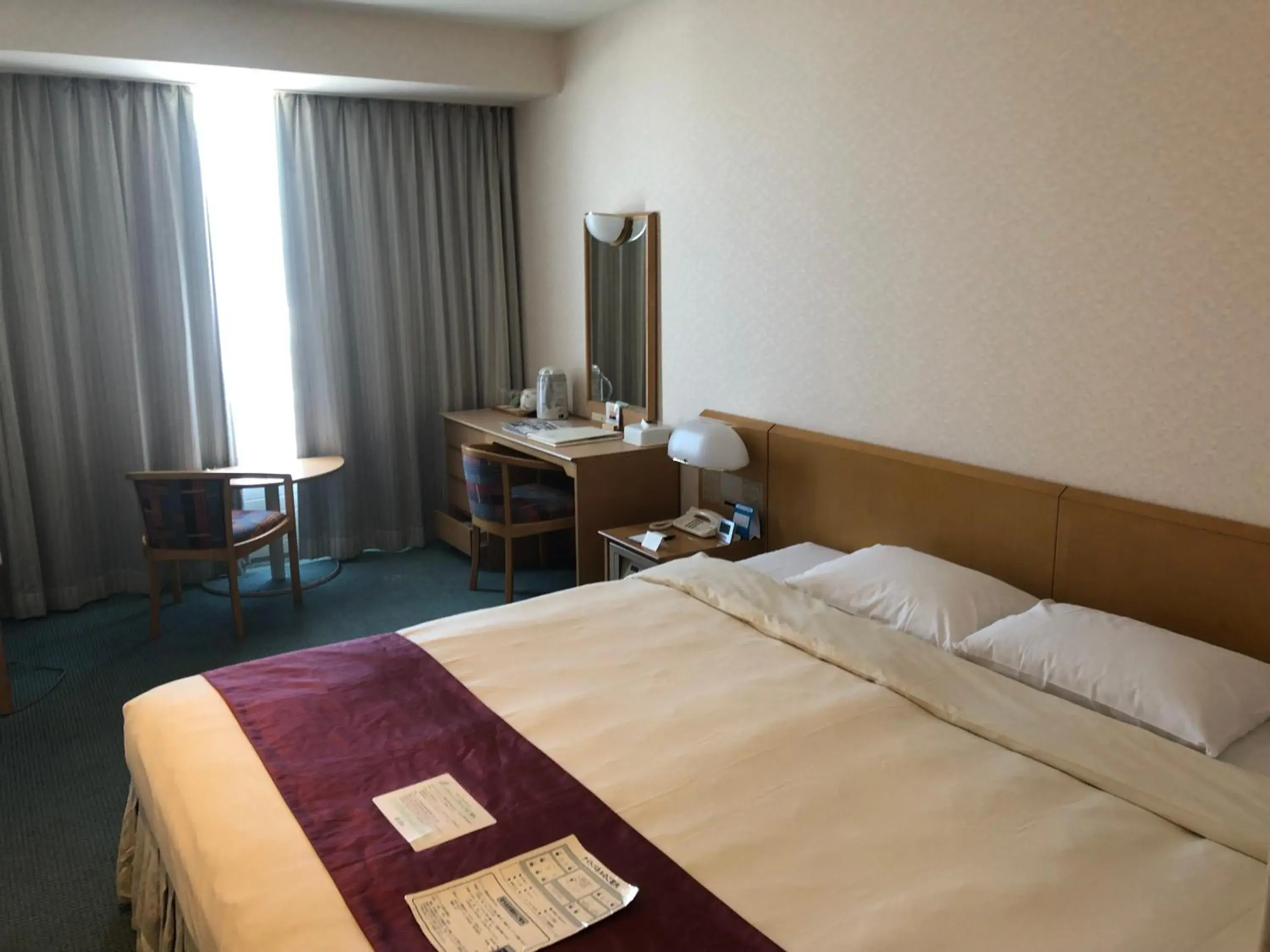 Living room, Bed in Kushiro Prince Hotel