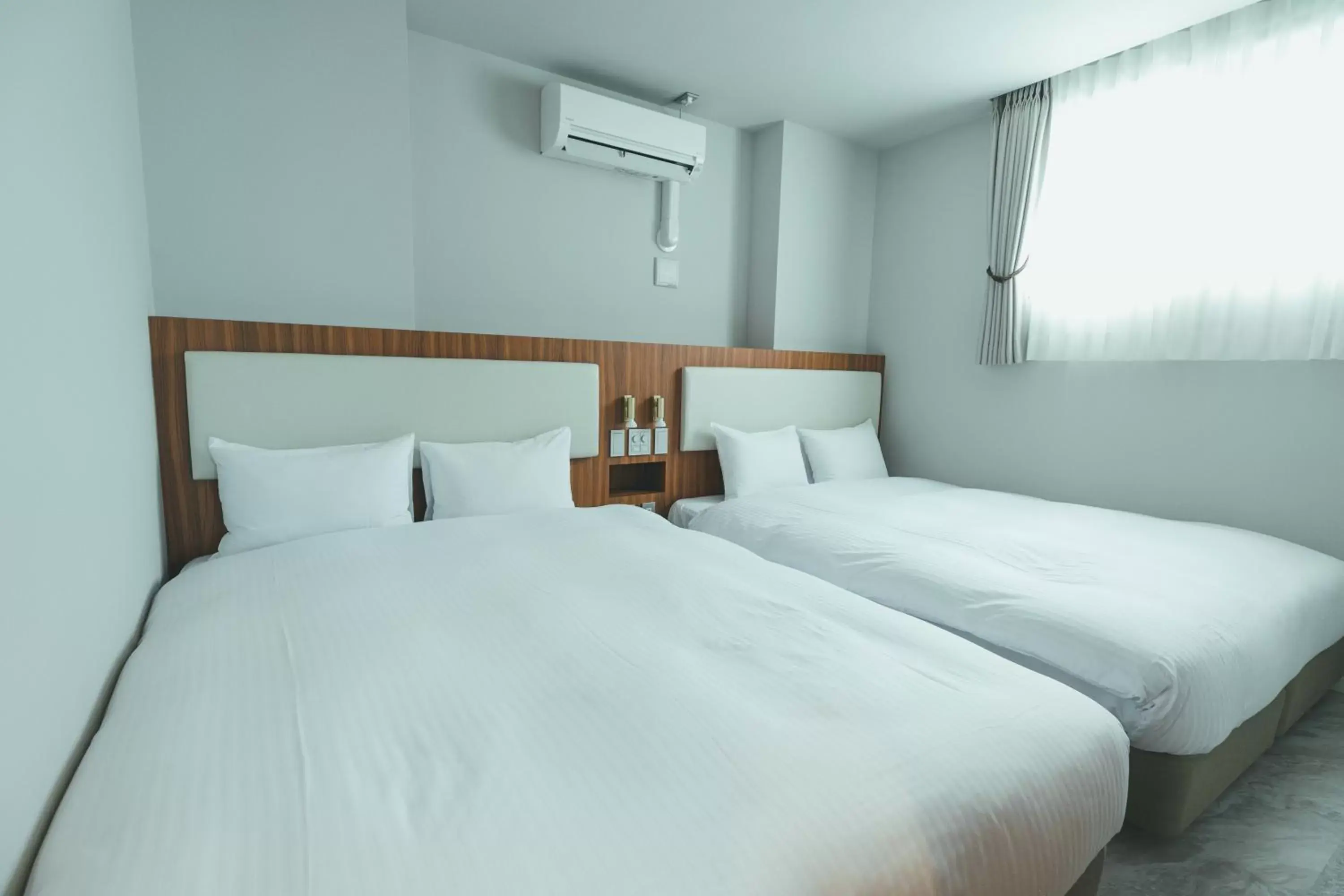 Bed in Liberated HOTEL Haruyoshi Kaichi Bed in Liberated HOTEL Haruyoshi Kaichi