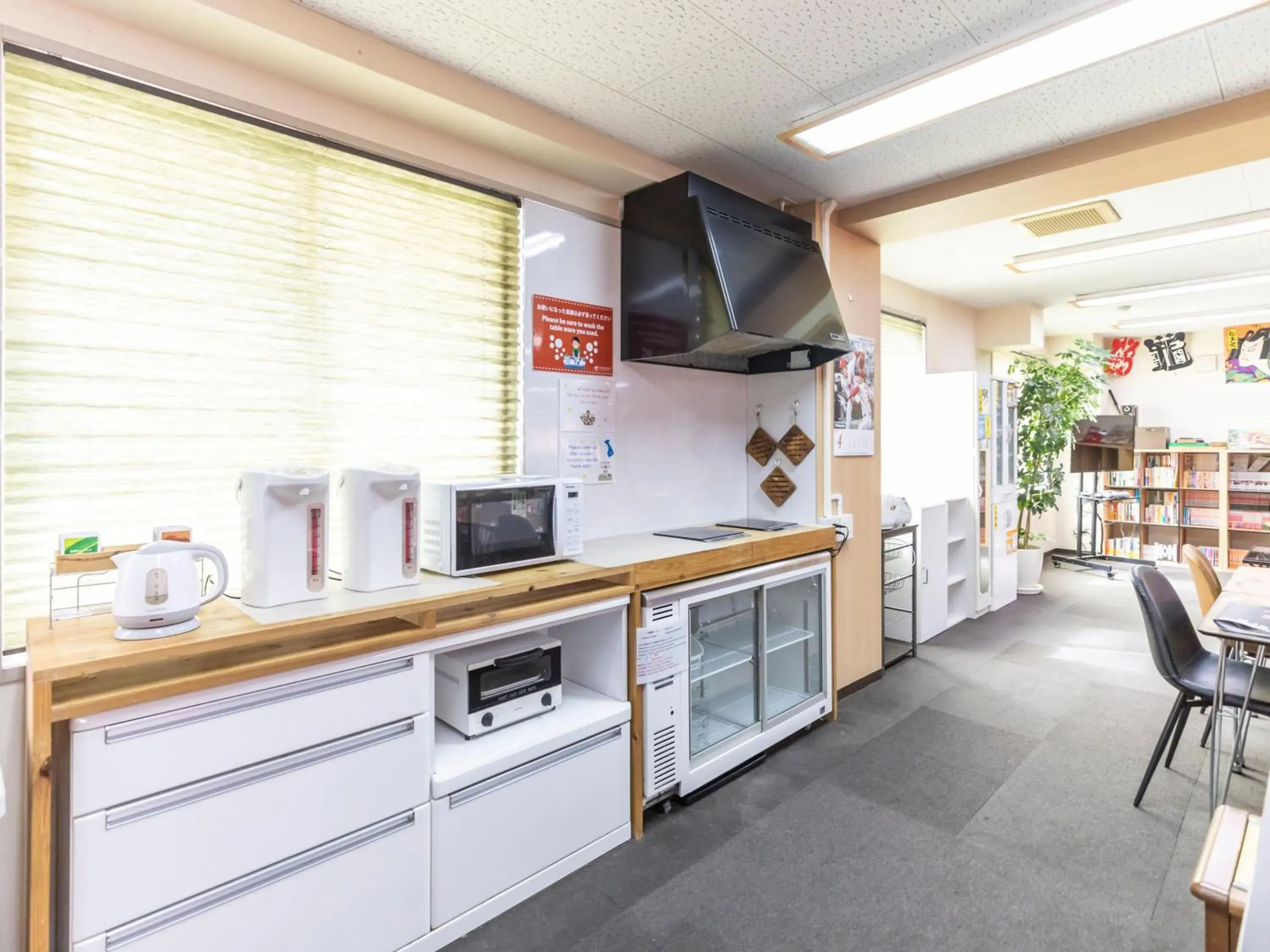 Kitchen or kitchenette, Kitchen/Kitchenette in Omotenashi Hostel Miyajima