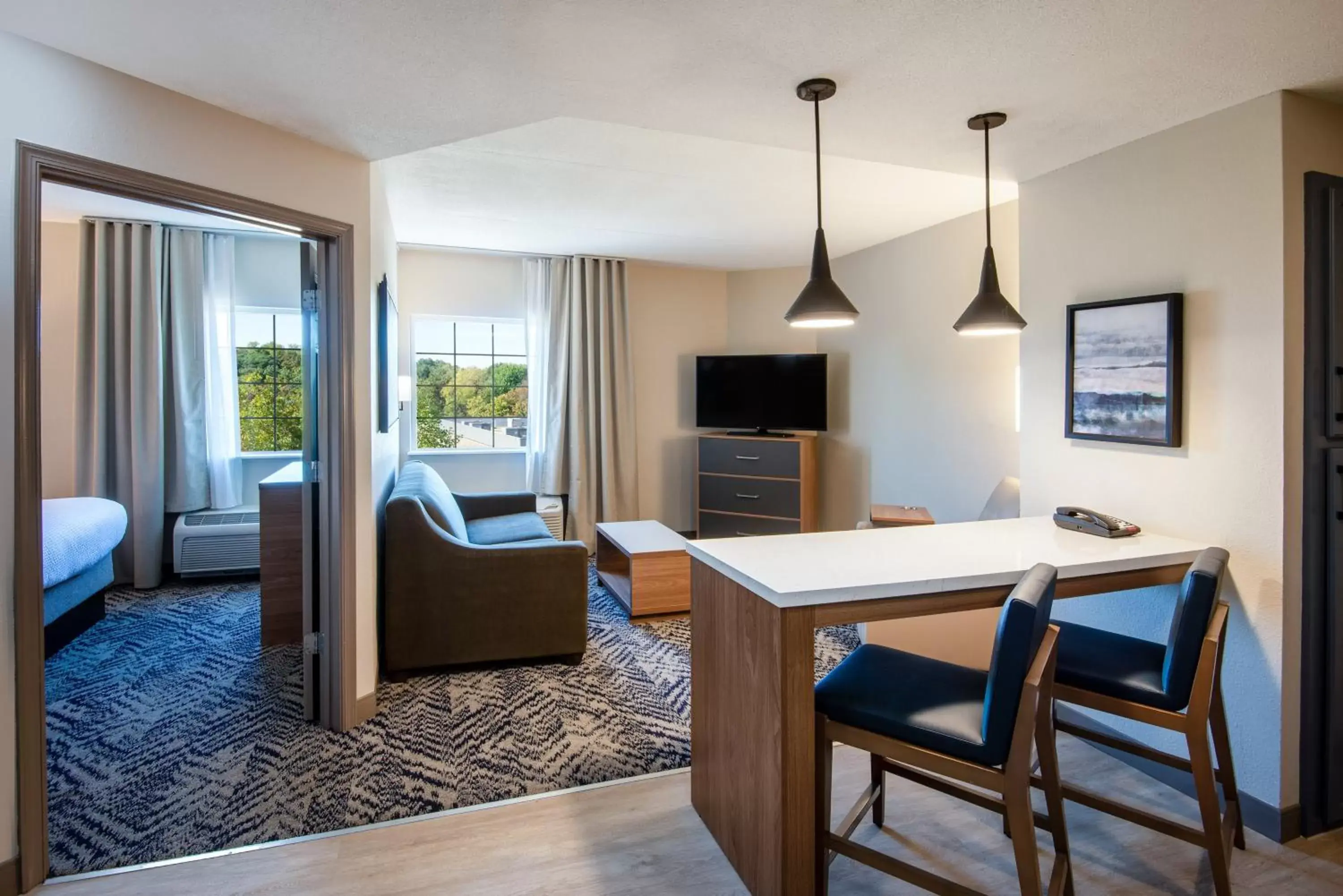 Bedroom, Seating Area in Candlewood Suites Manassas, an IHG Hotel