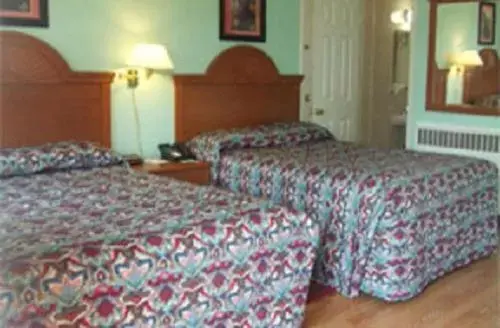 Bed in Robin Hood Motel