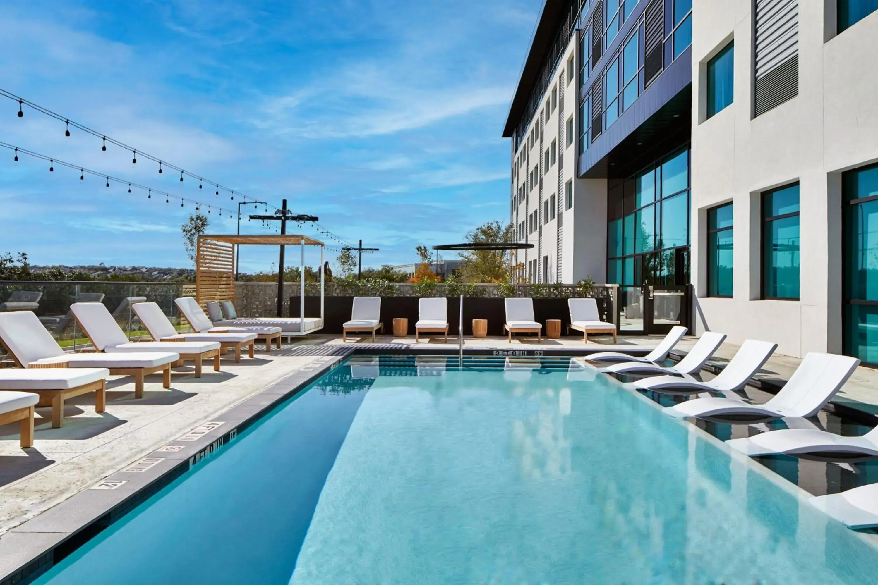 Swimming Pool in AC Hotel by Marriott Austin Hill Country
