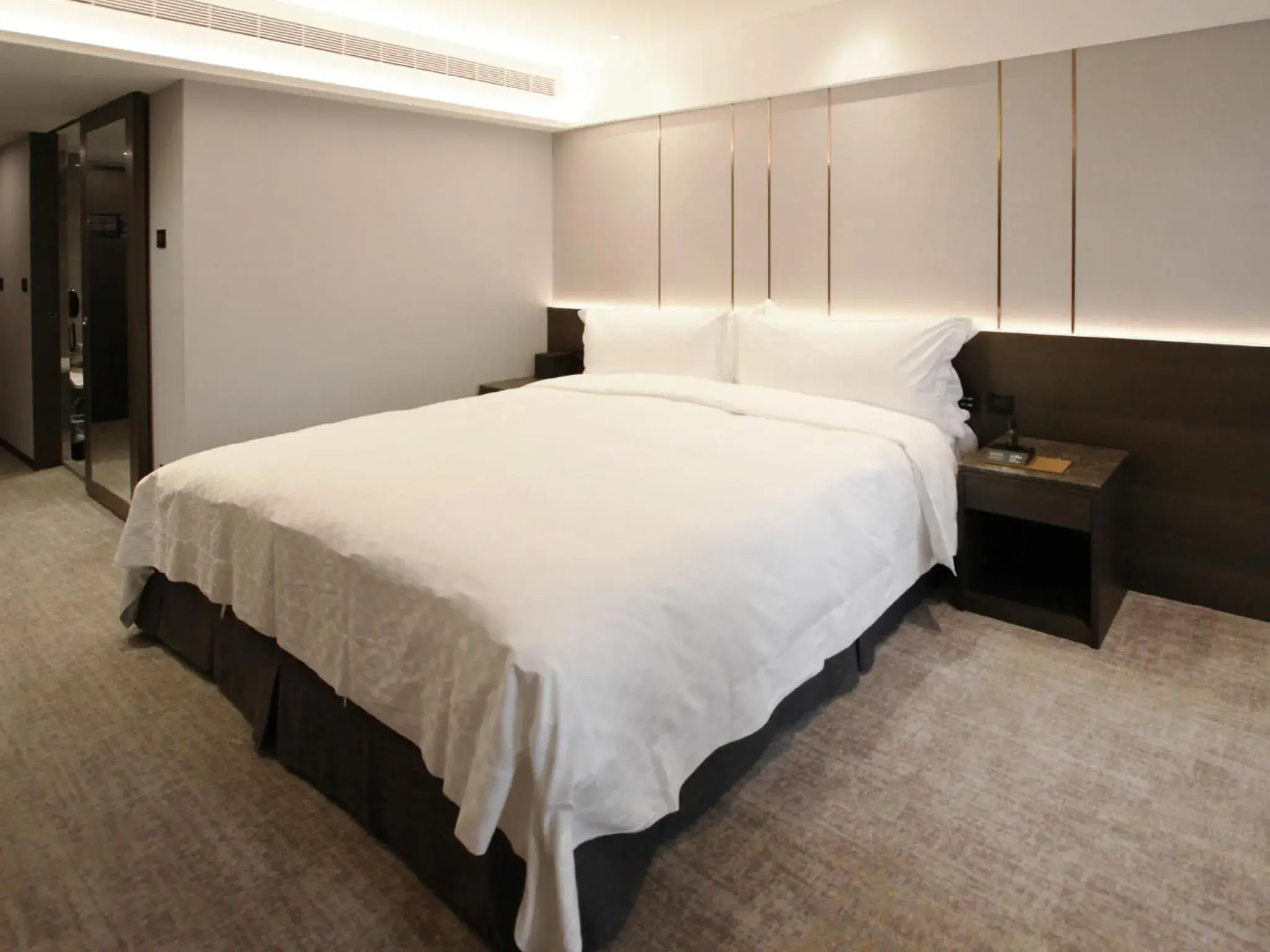 Bed in Tango Hotel Taipei Linsen