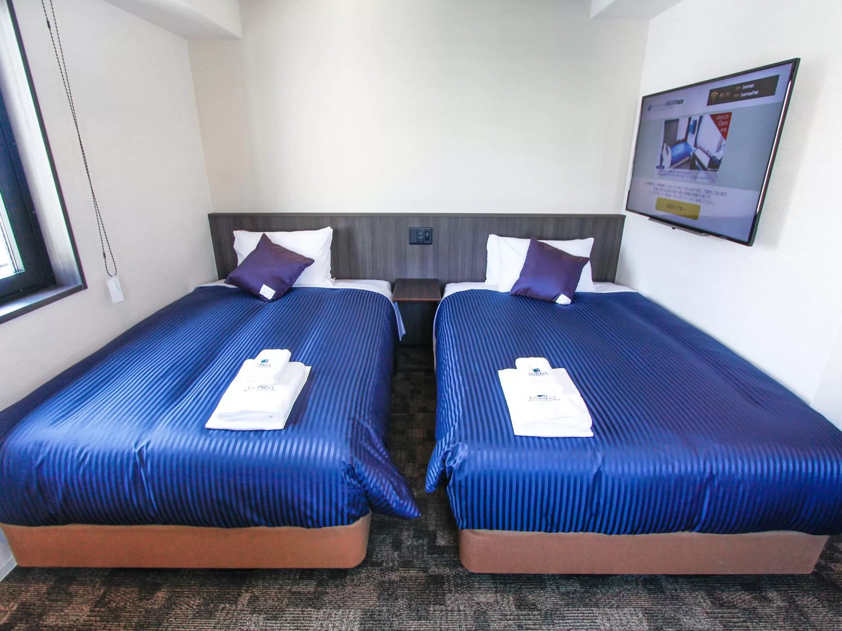 Bed in HOTEL LiVEMAX Osaka Yodoyabashi