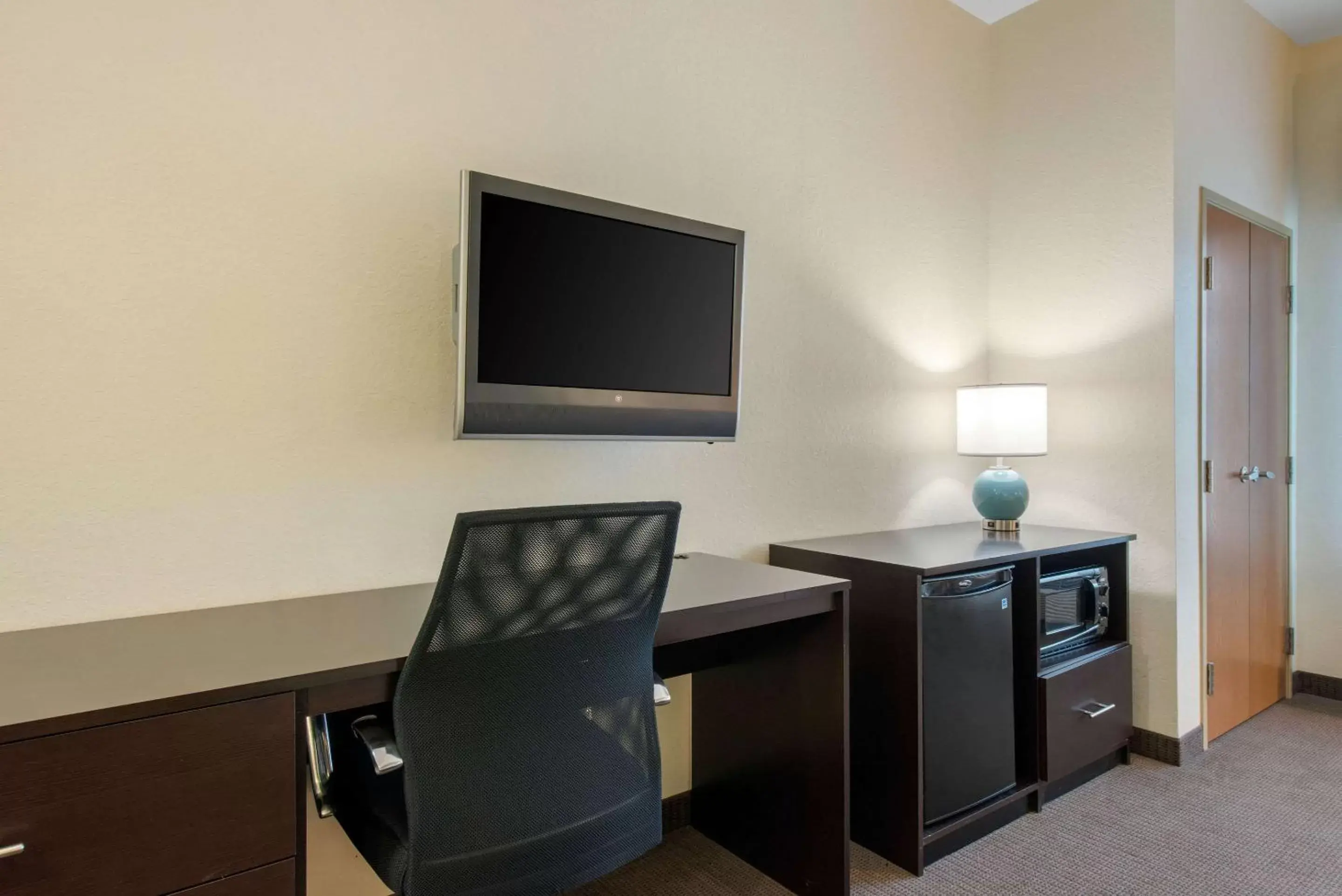 Photo of the whole room, TV/Entertainment Center in Sleep Inn & Suites Port Charlotte-Punta Gorda