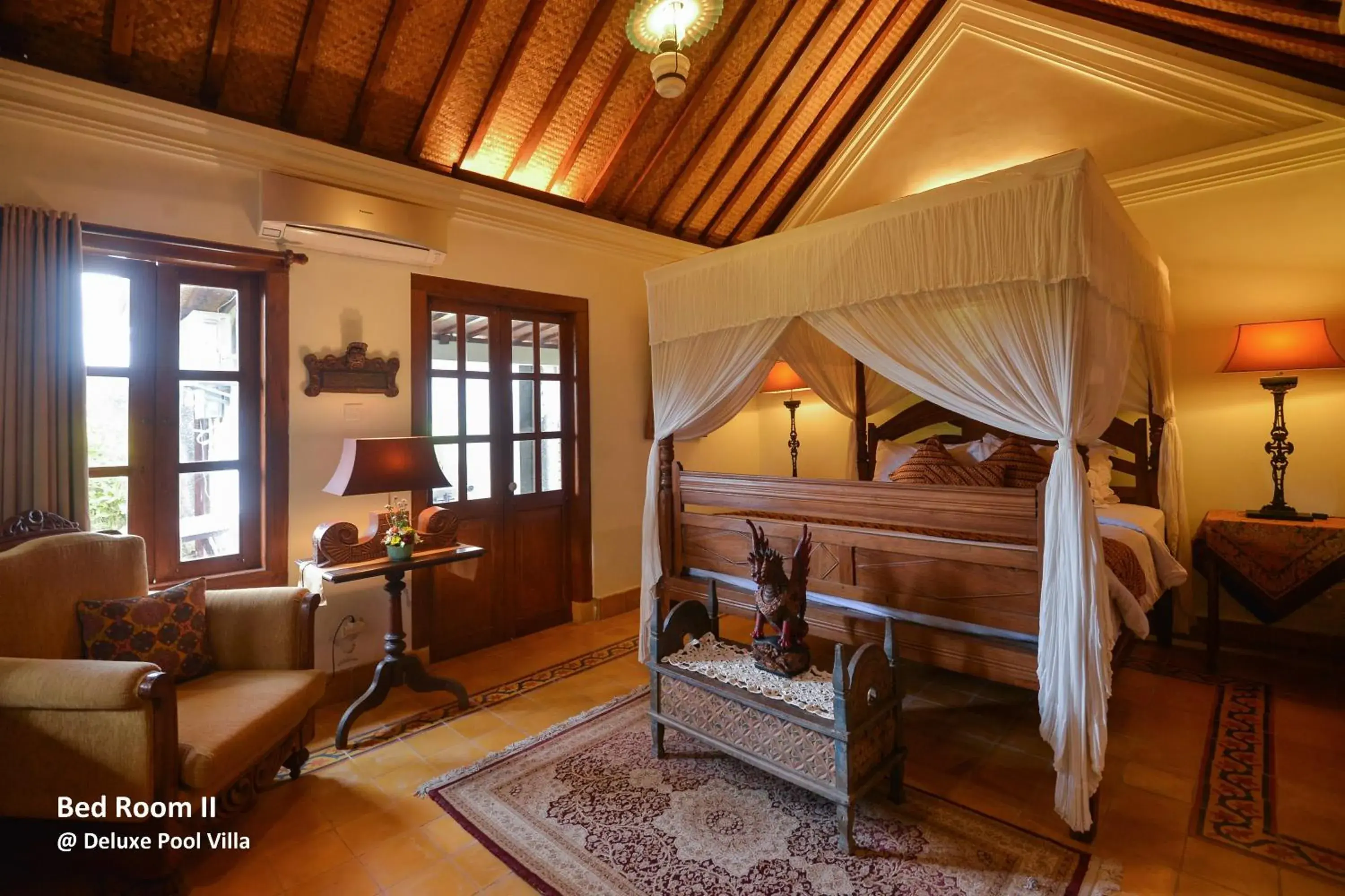 Bed, Seating Area in Ubud Syailendra Heritage Villas by EPS