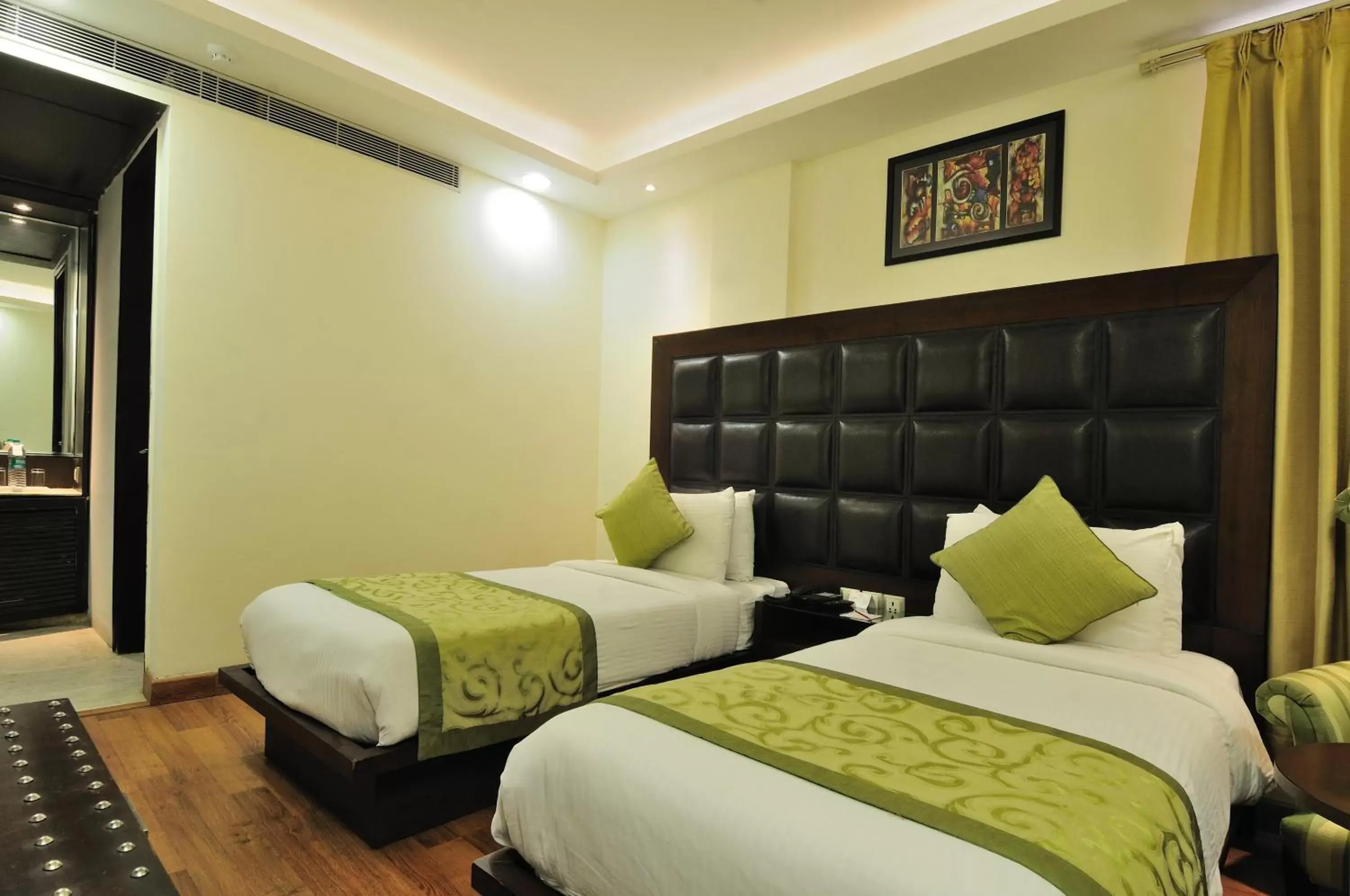 Photo of the whole room, Bed in The Grand Orion - Kailash Colony