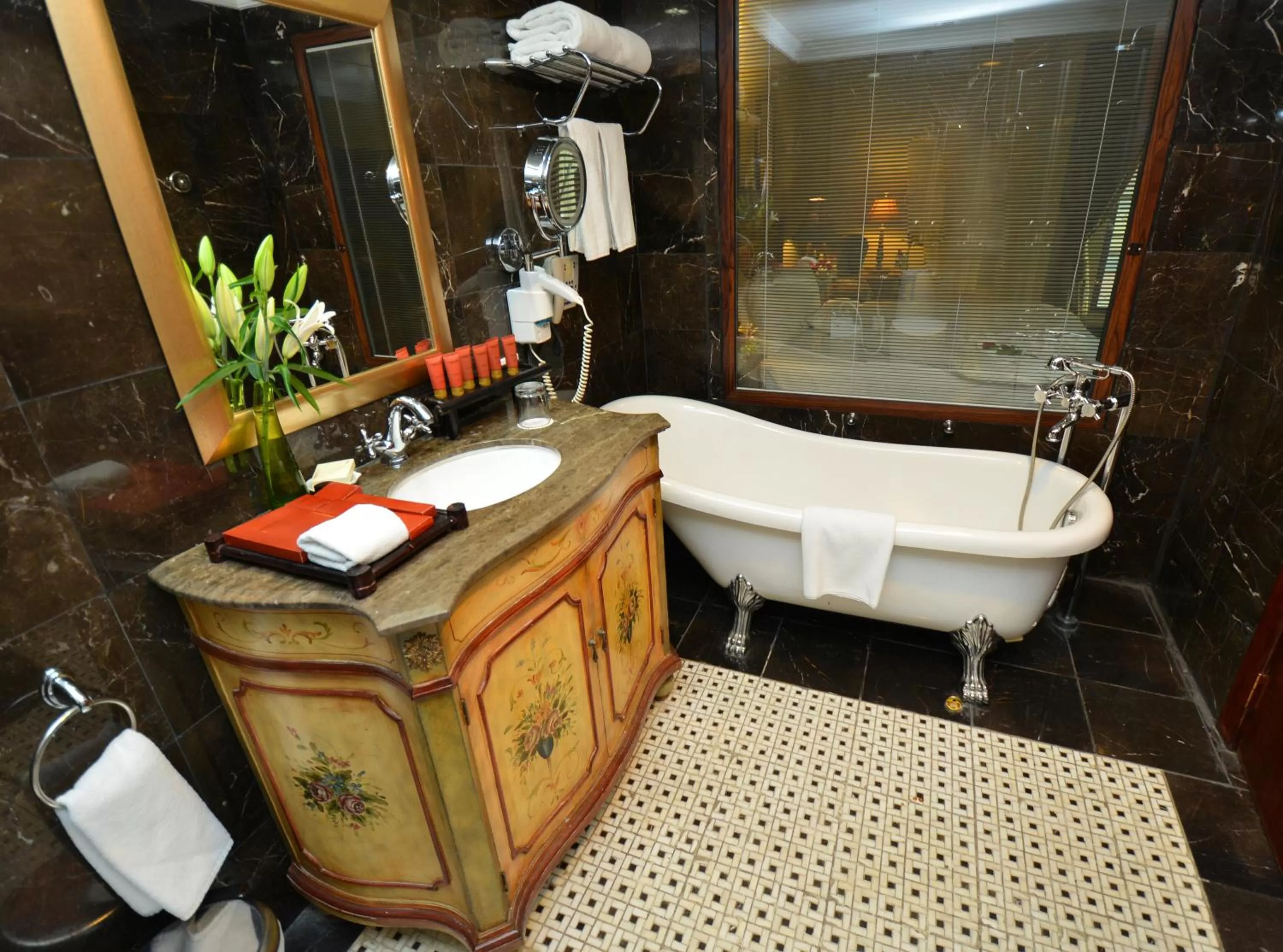 Bathroom in The Convention Center & Royal Suites Hotel