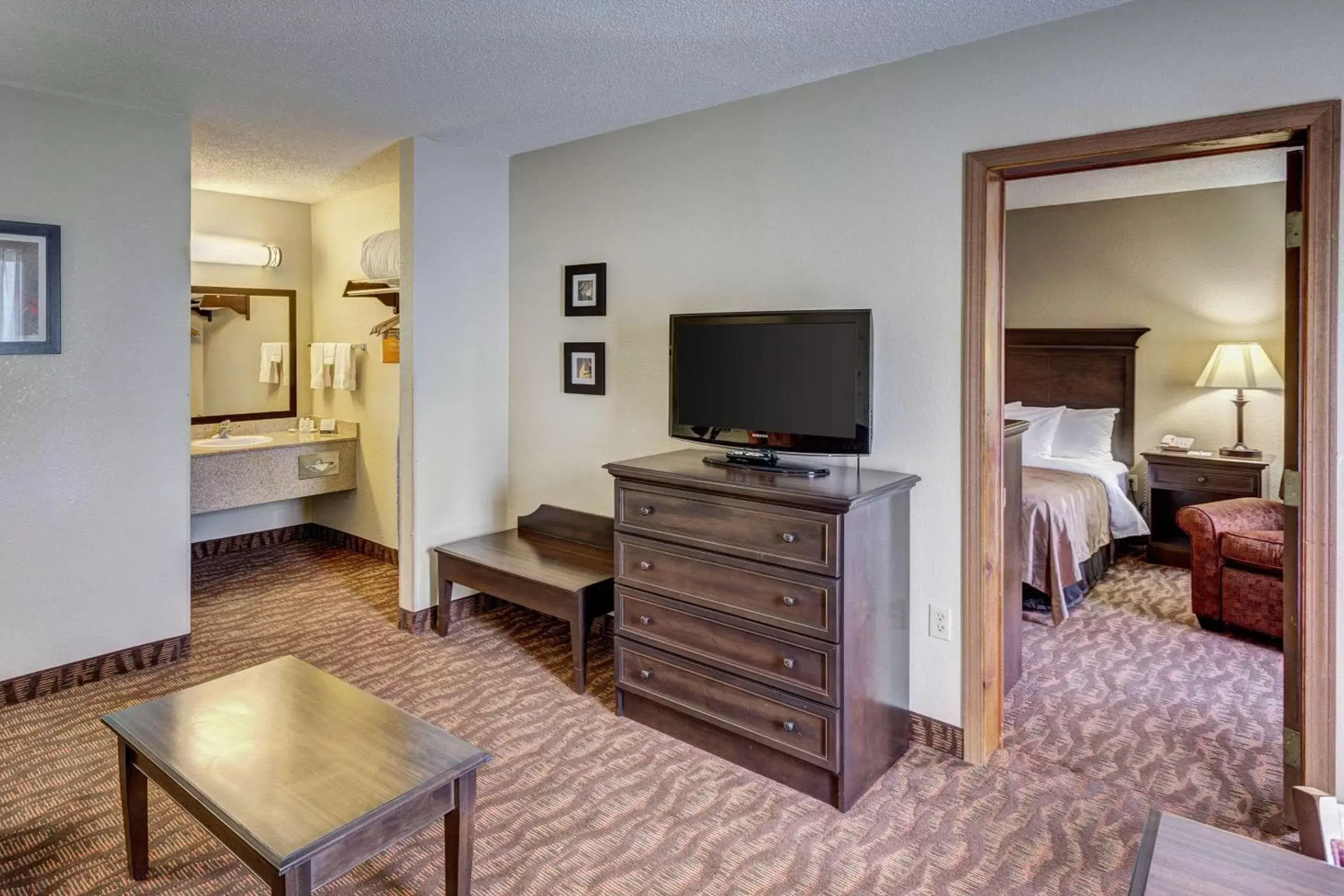 Photo of the whole room, TV/Entertainment Center in Quality Inn West