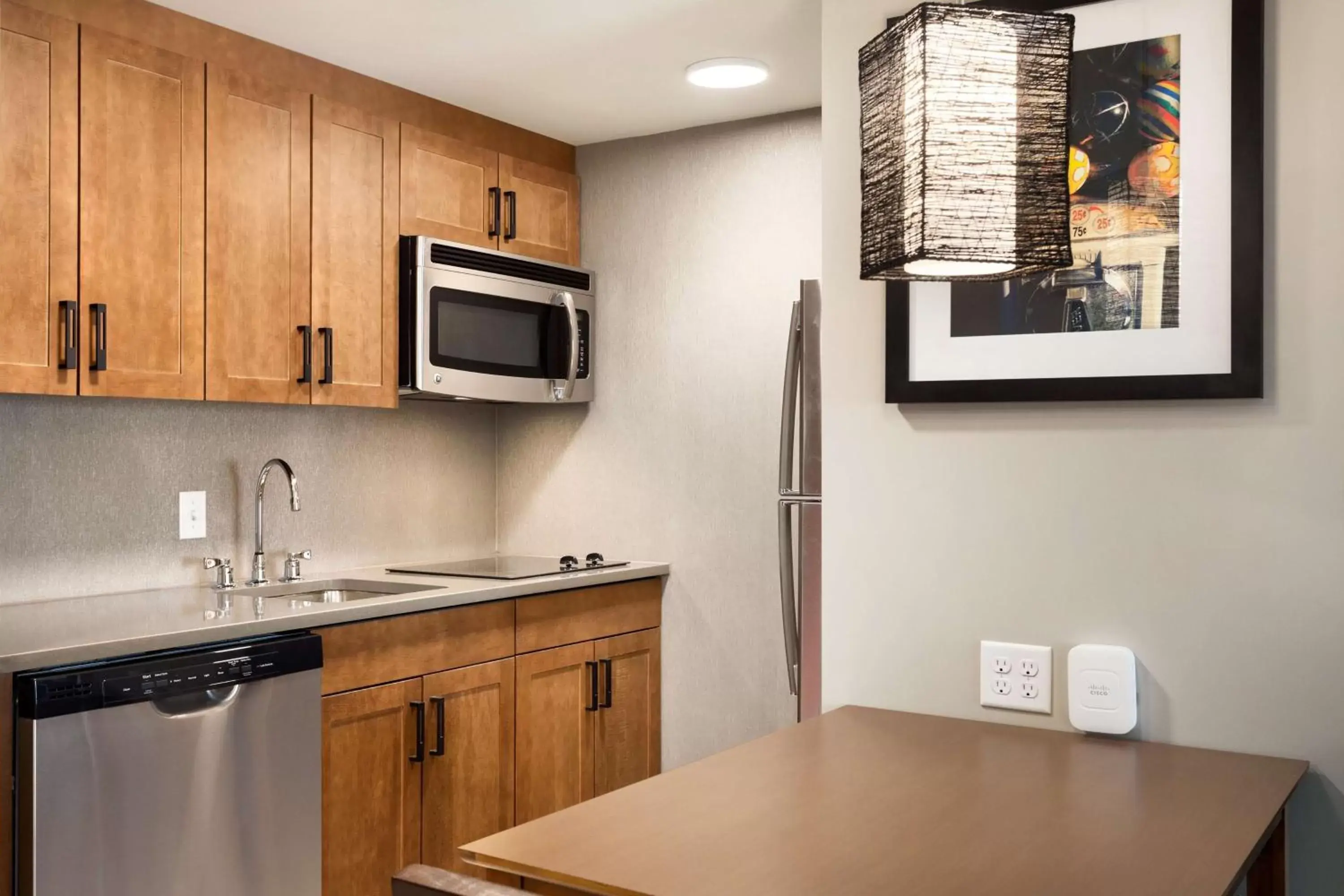 Kitchen or kitchenette, Kitchen/Kitchenette in Homewood Suites by Hilton Syracuse - Carrier Circle