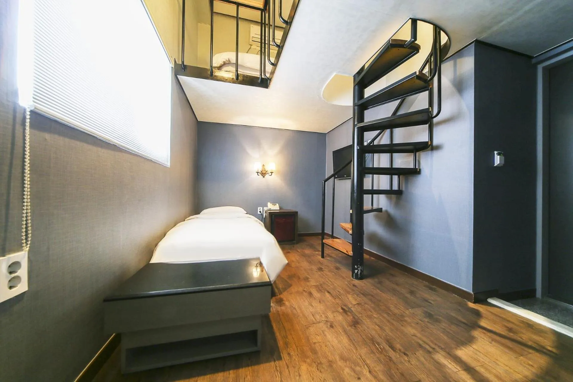 Bed in Friendly DH Naissance Hotel by Mindrum Group