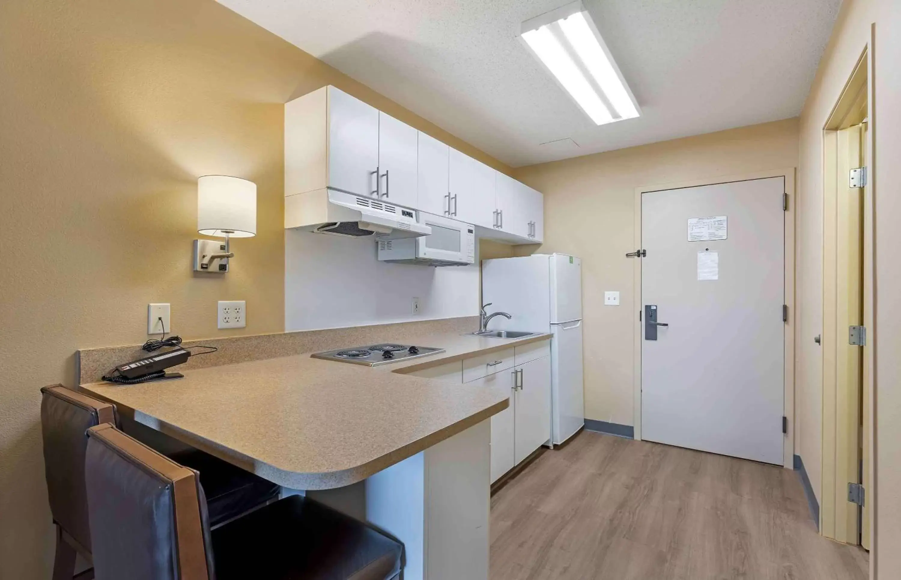 Bedroom, Kitchen/Kitchenette in Extended Stay America Suites - St Louis - Airport - Central