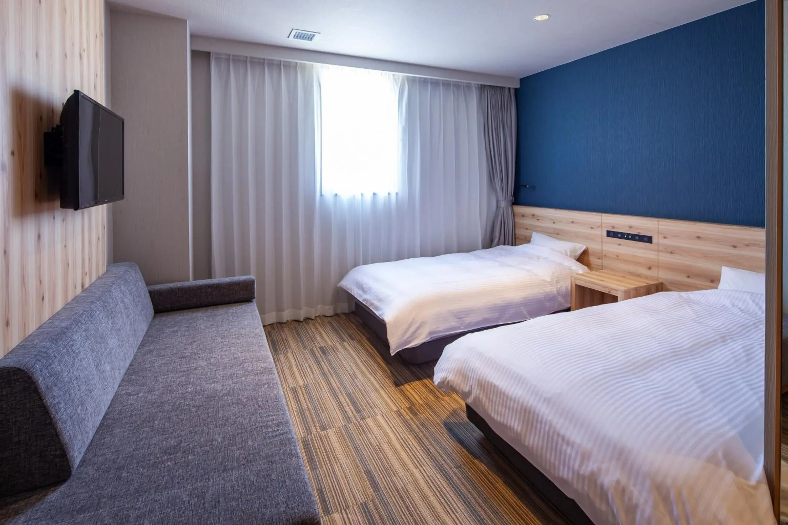 Photo of the whole room, Bed in Y's CABIN&HOTEL Naha Kokusai Street