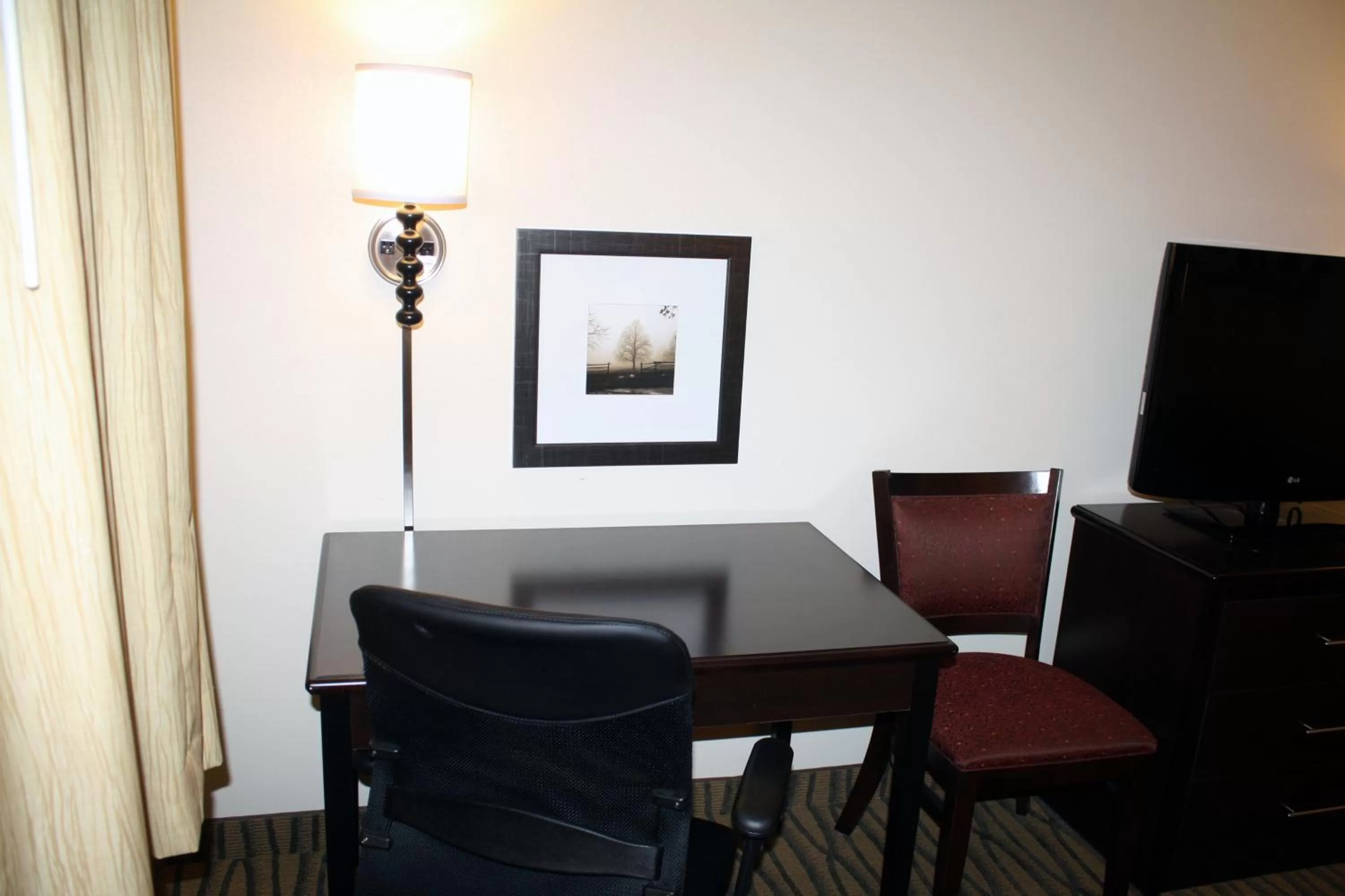 Living room, Seating Area in AmericInn by Wyndham Rogers