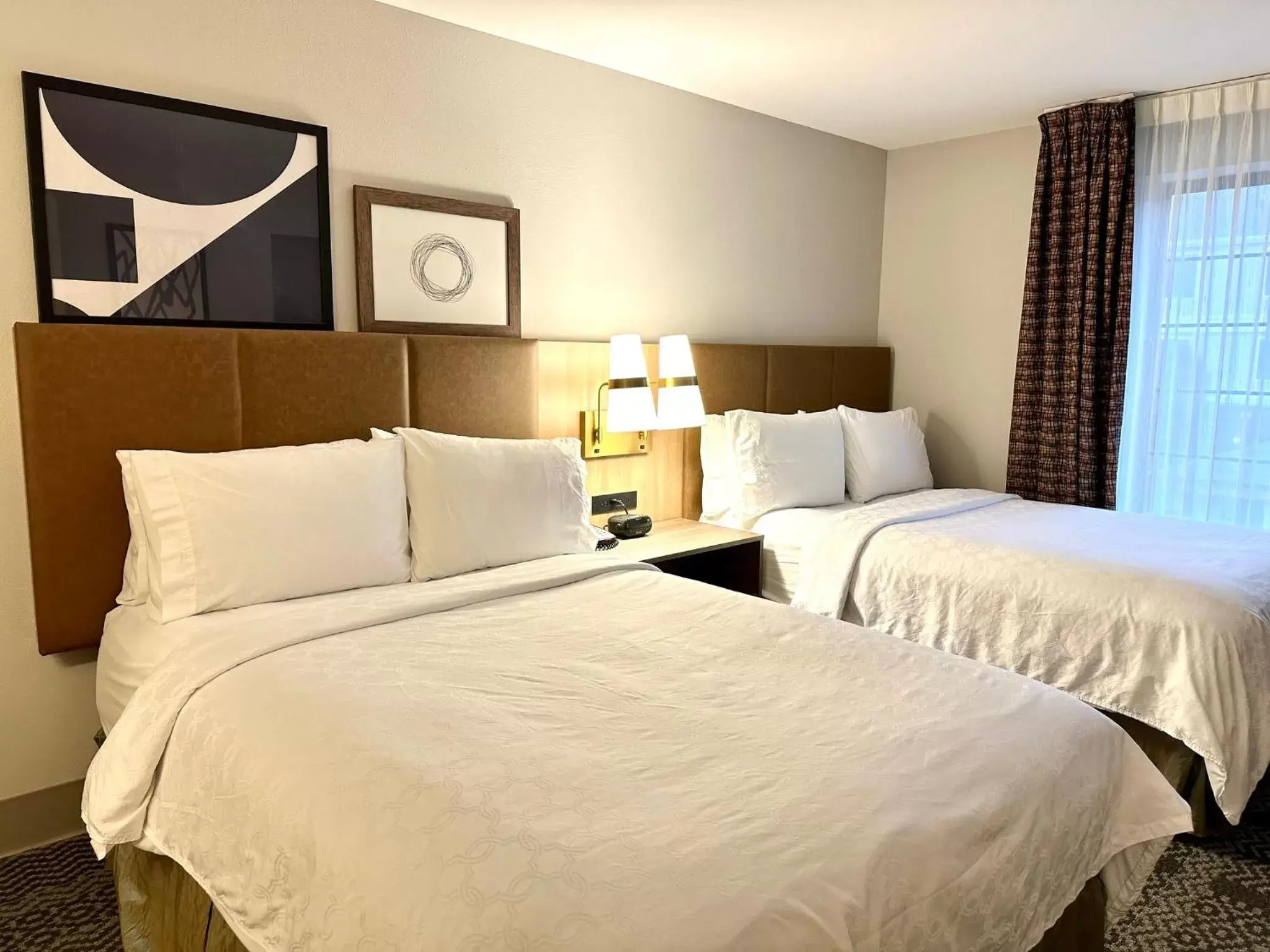 Photo of the whole room, Bed in Staybridge Suites Milwaukee West-Oconomowoc, an IHG Hotel