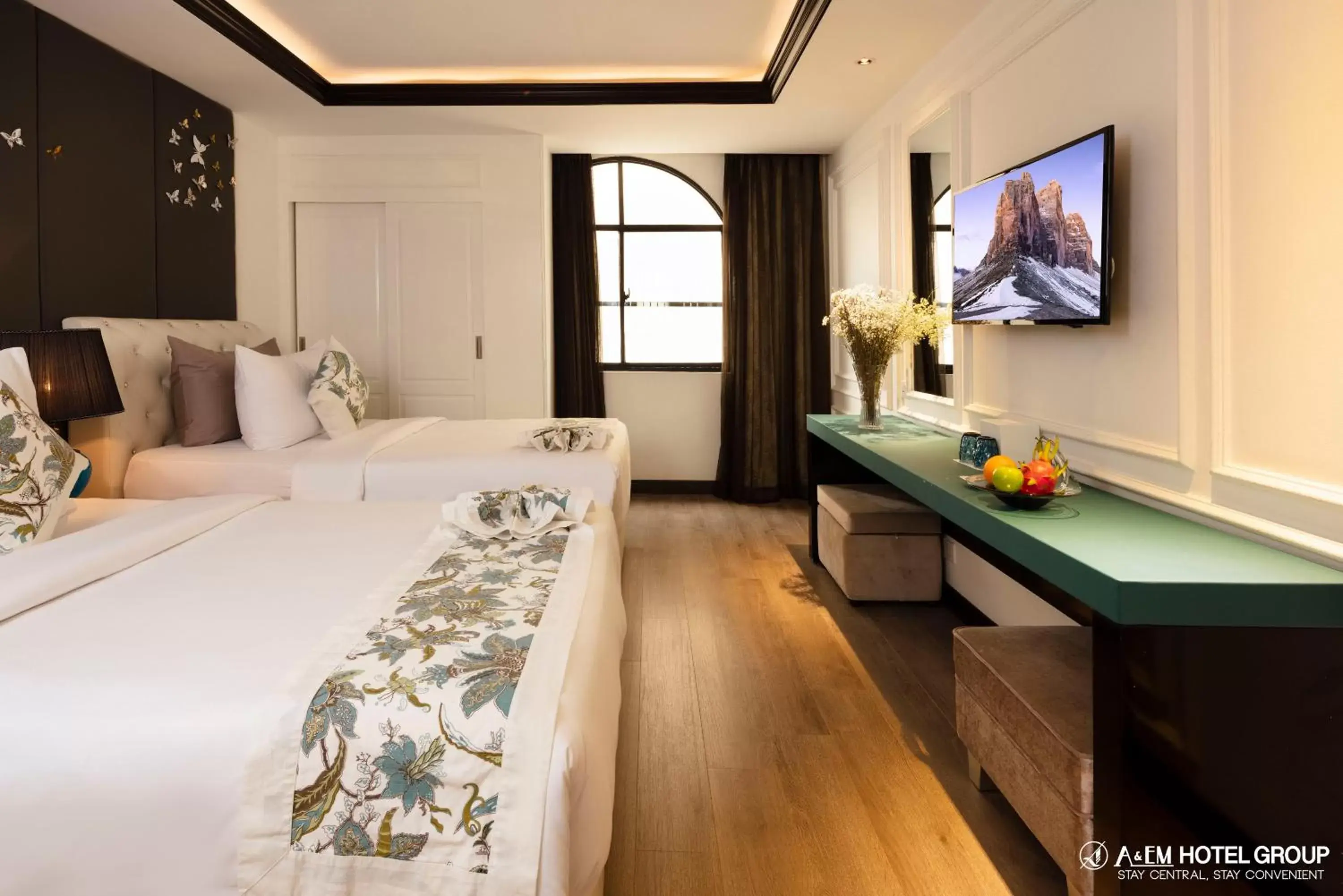 Bed in A&EM Saigon Hotel Bed in A&EM Saigon Hotel