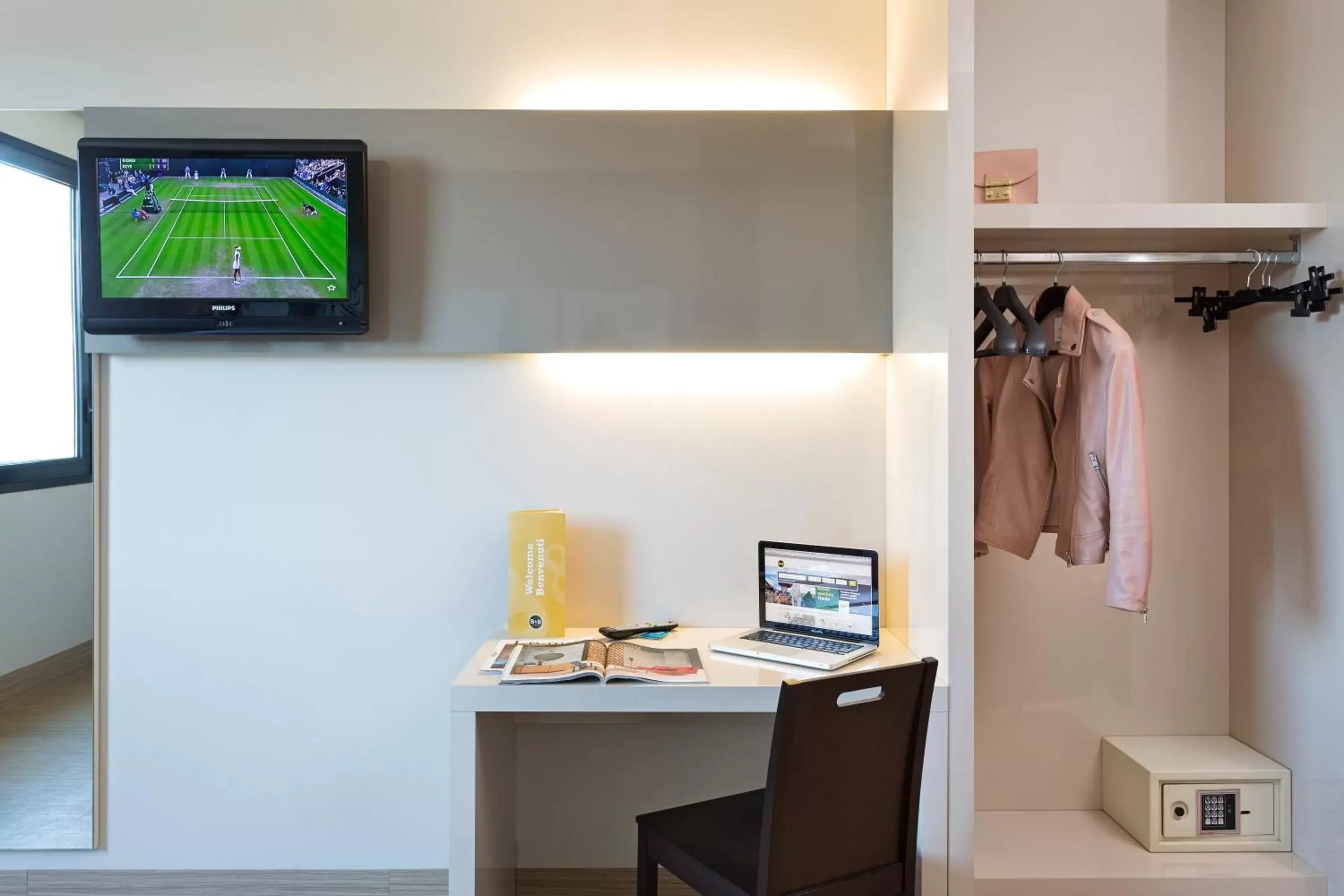 Photo of the whole room, TV/Entertainment Center in B&B Hotel Ferrara