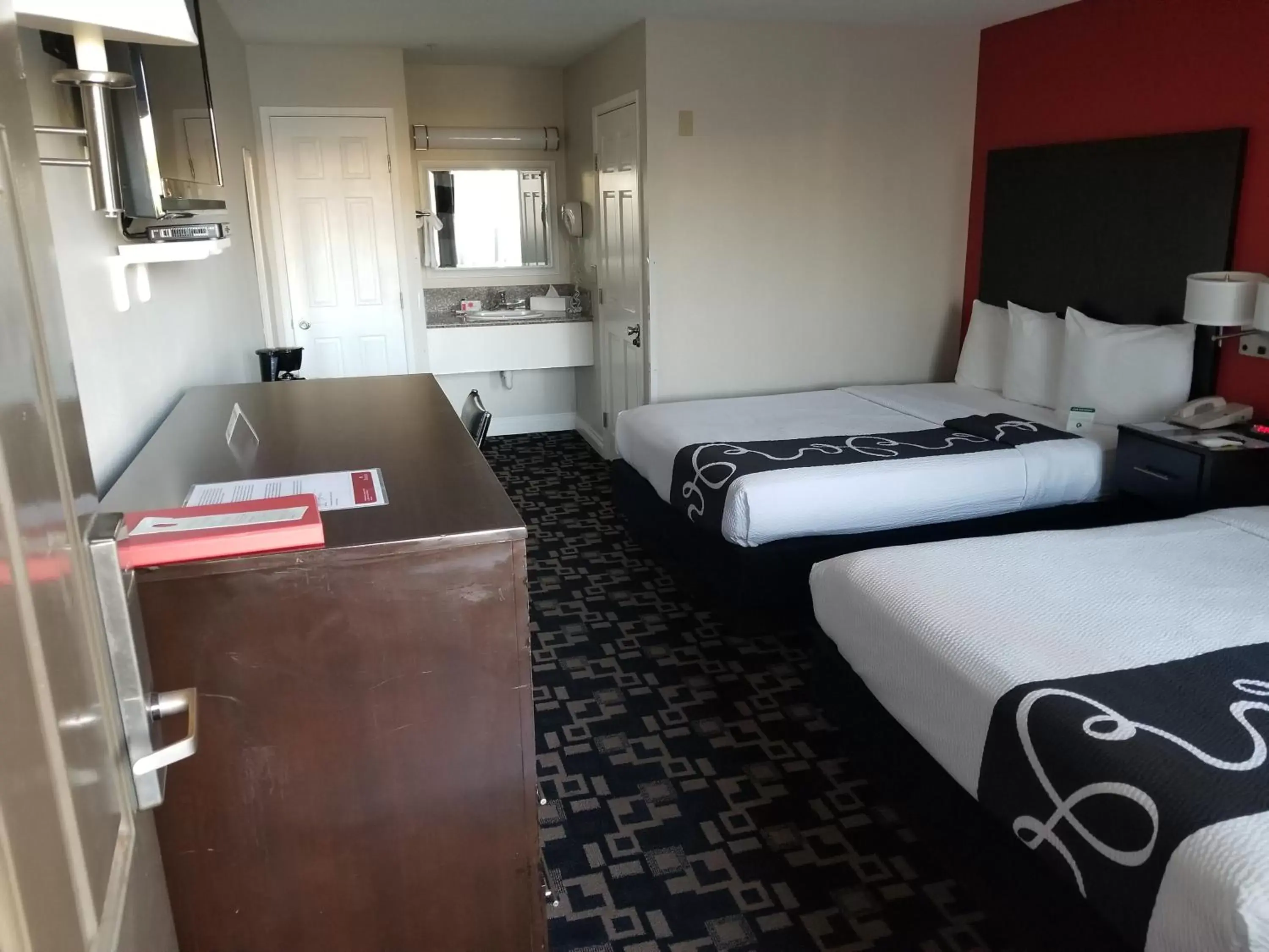 Bed in Ramada by Wyndham Oceanside