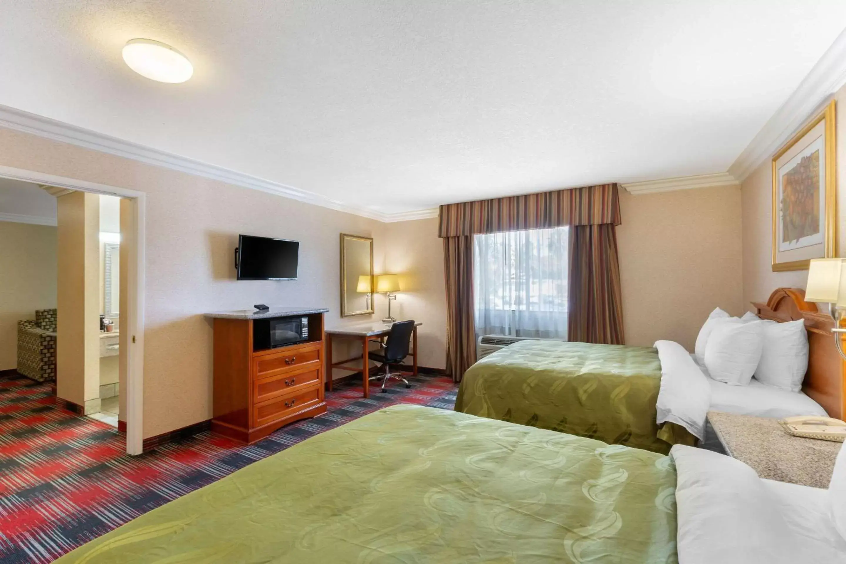 Photo of the whole room, TV/Entertainment Center in Quality Inn & Suites Oceanside Near Camp Pendleton