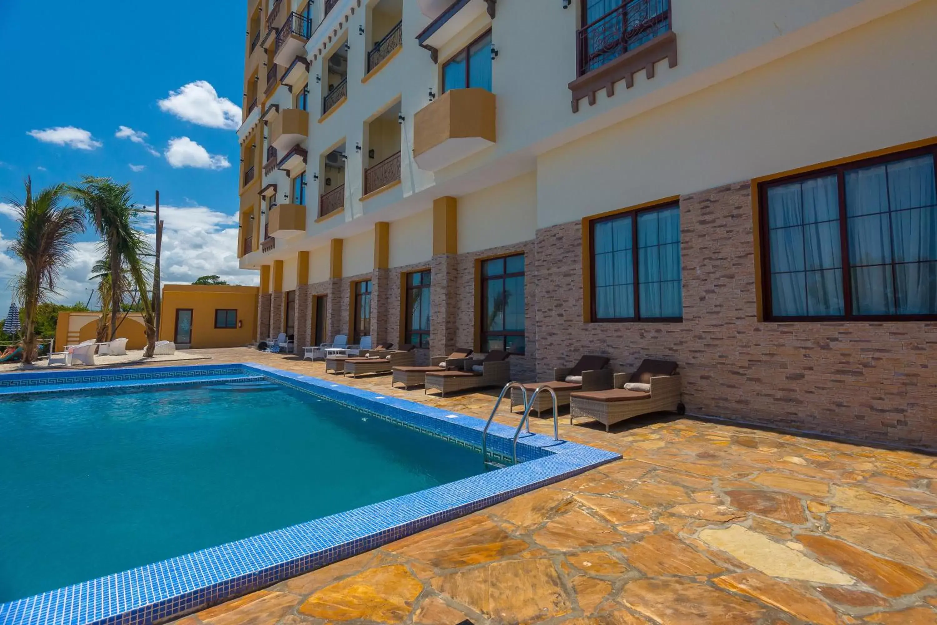 Swimming pool, Property Building in Golden Tulip Zanzibar Resort