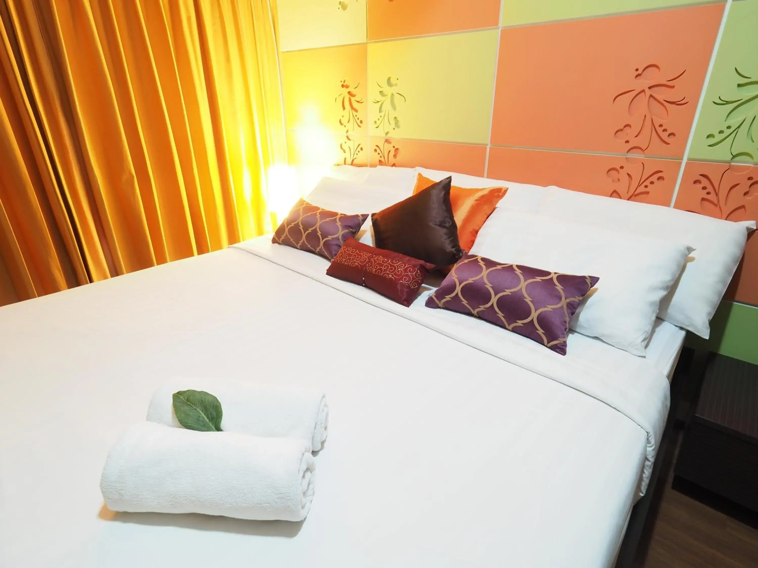 Bed in Bella B All Suite Bangkok