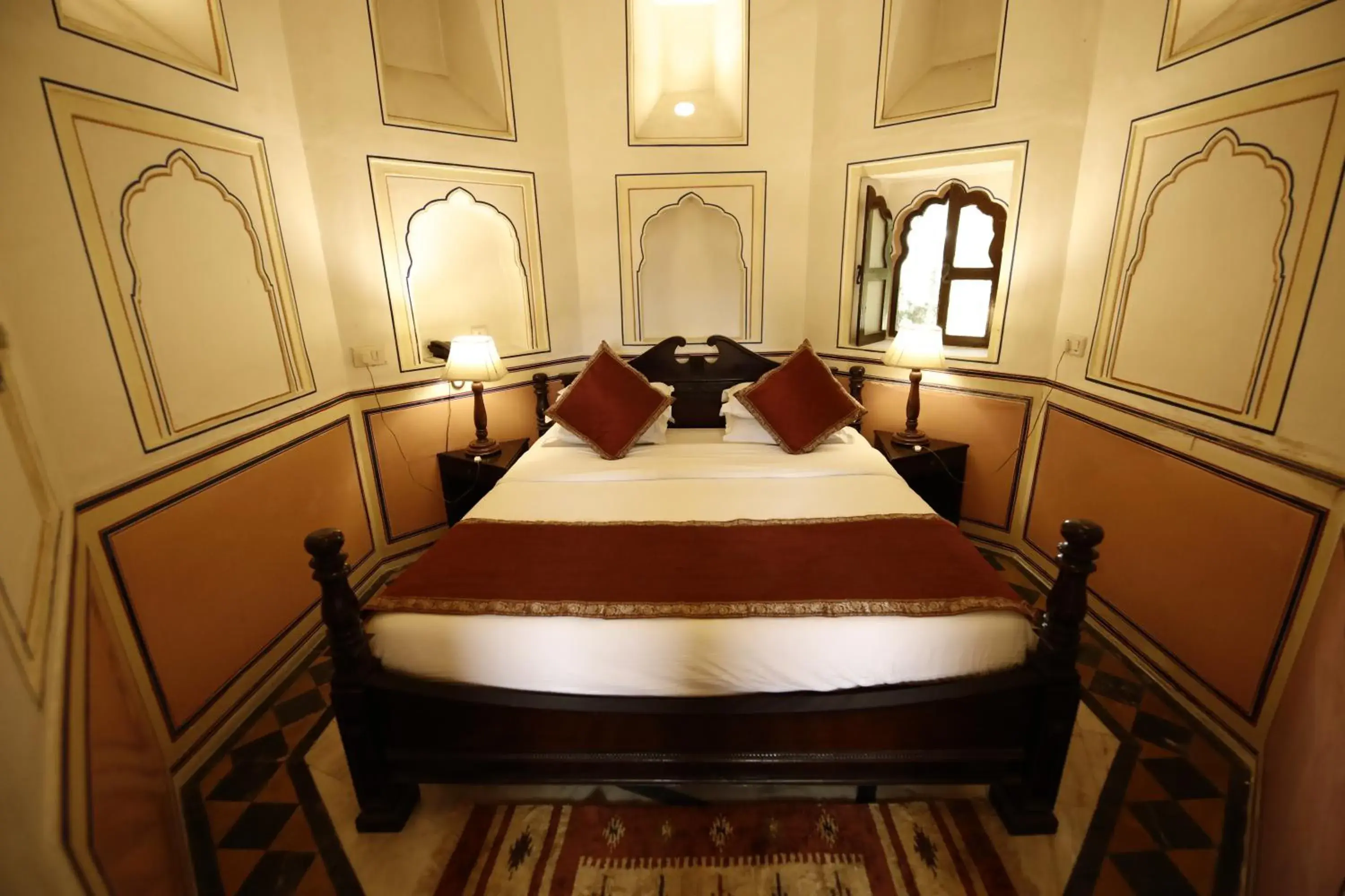 Bed in Hotel Narain Niwas Palace